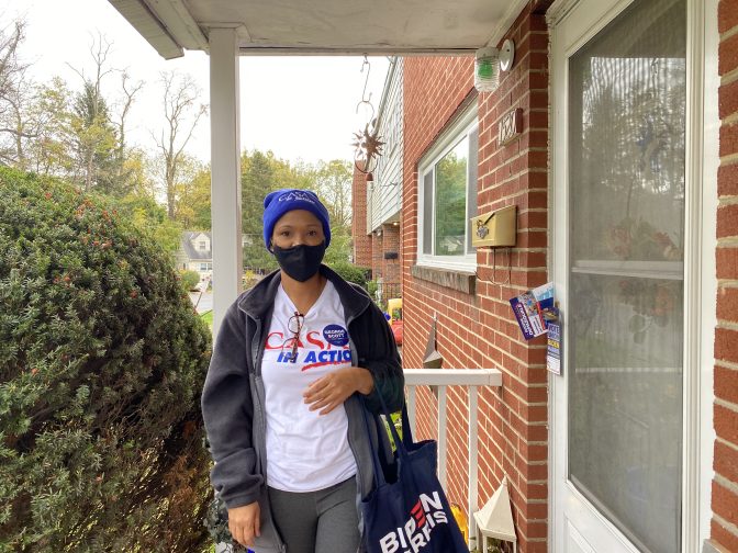 Ana Nunez knocks on doors in the Allison Hill neighborhood of Harrisburg for the advocacy group CASA in Action. Alanna Elder/WITF