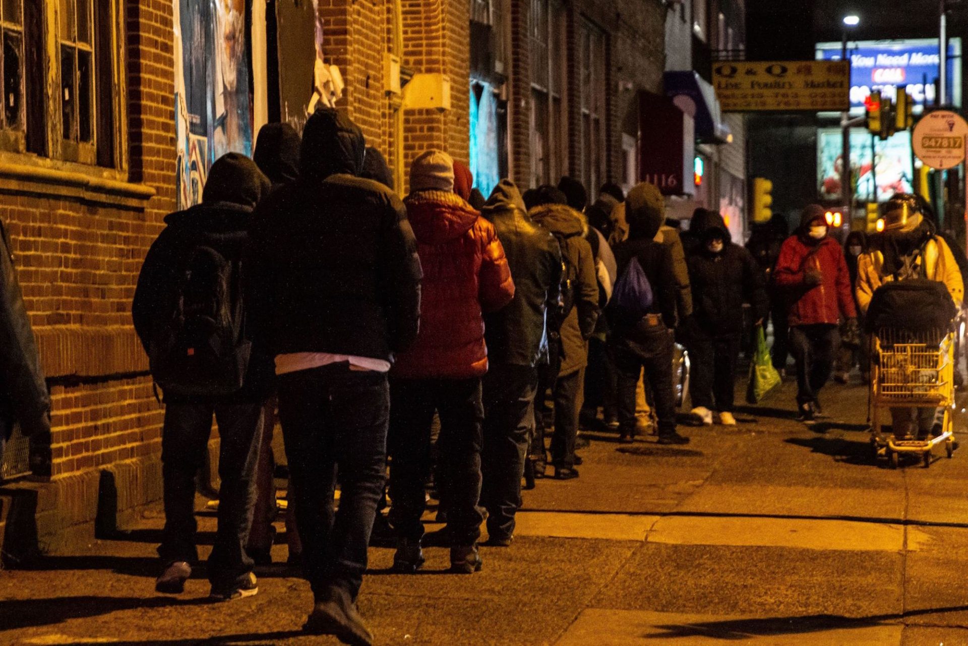 The line to receive hot food from Chosen 300 Ministries during their regular Wednesday meal on Spring Garden Street in Philadelphia.