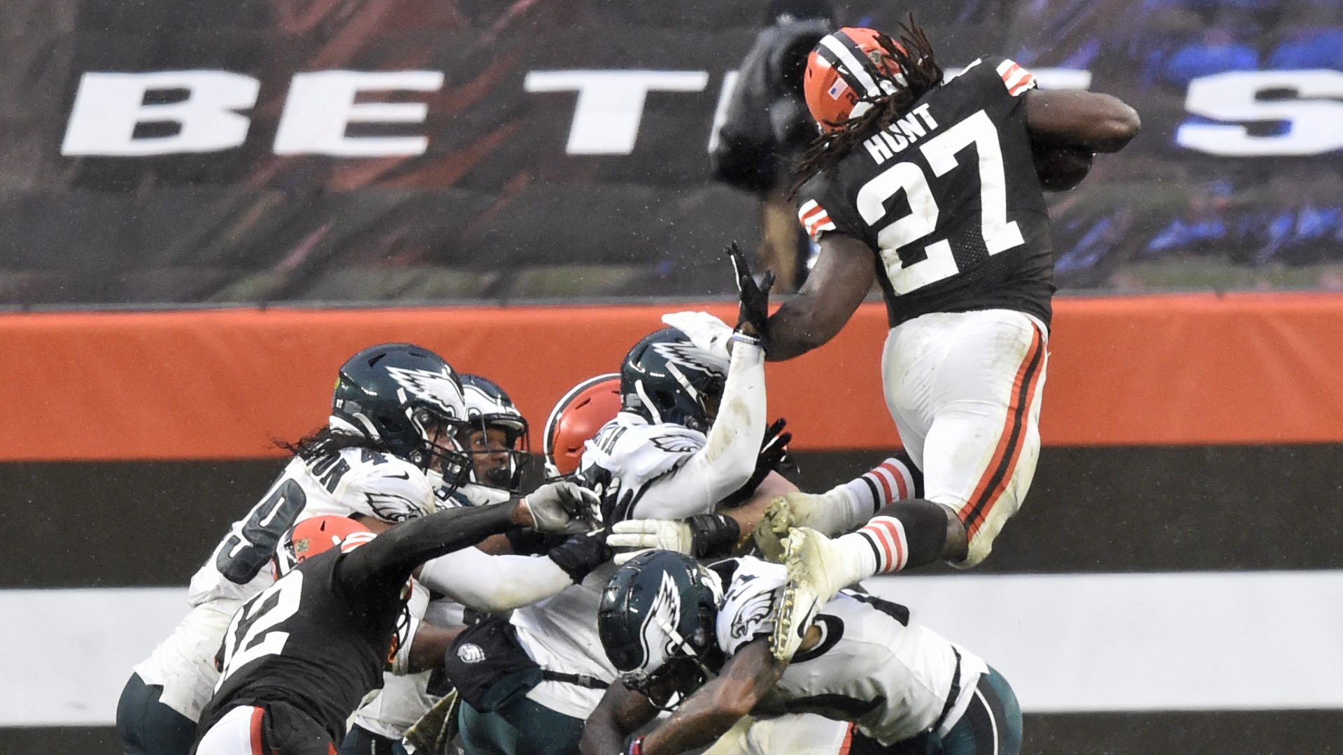 Cleveland Browns running back Kareem Hunt (27) rushes for a five-yard touchdown during the second half of an NFL football game against the Philadelphia Eagles, Sunday, Nov. 22, 2020, in Cleveland. The Browns won 22-17.