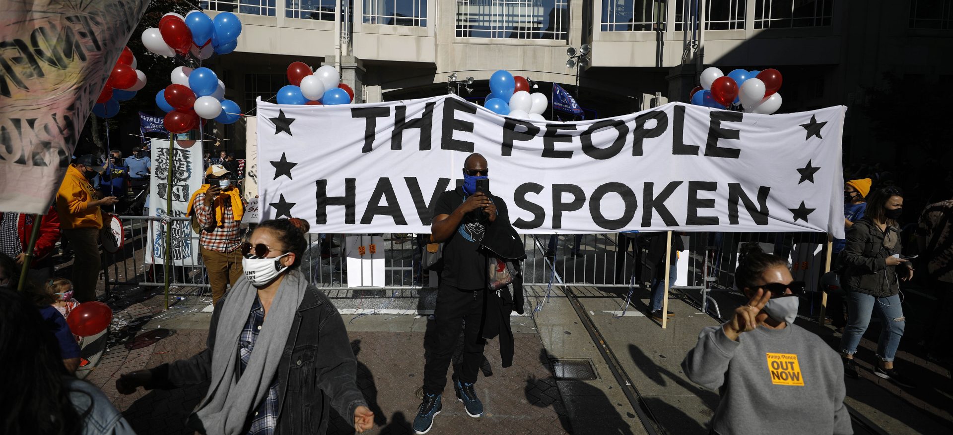 Demonstrators rally outside the Pennsylvania Convention Center where votes are being counted, Friday, Nov. 6, 2020, in Philadelphia.