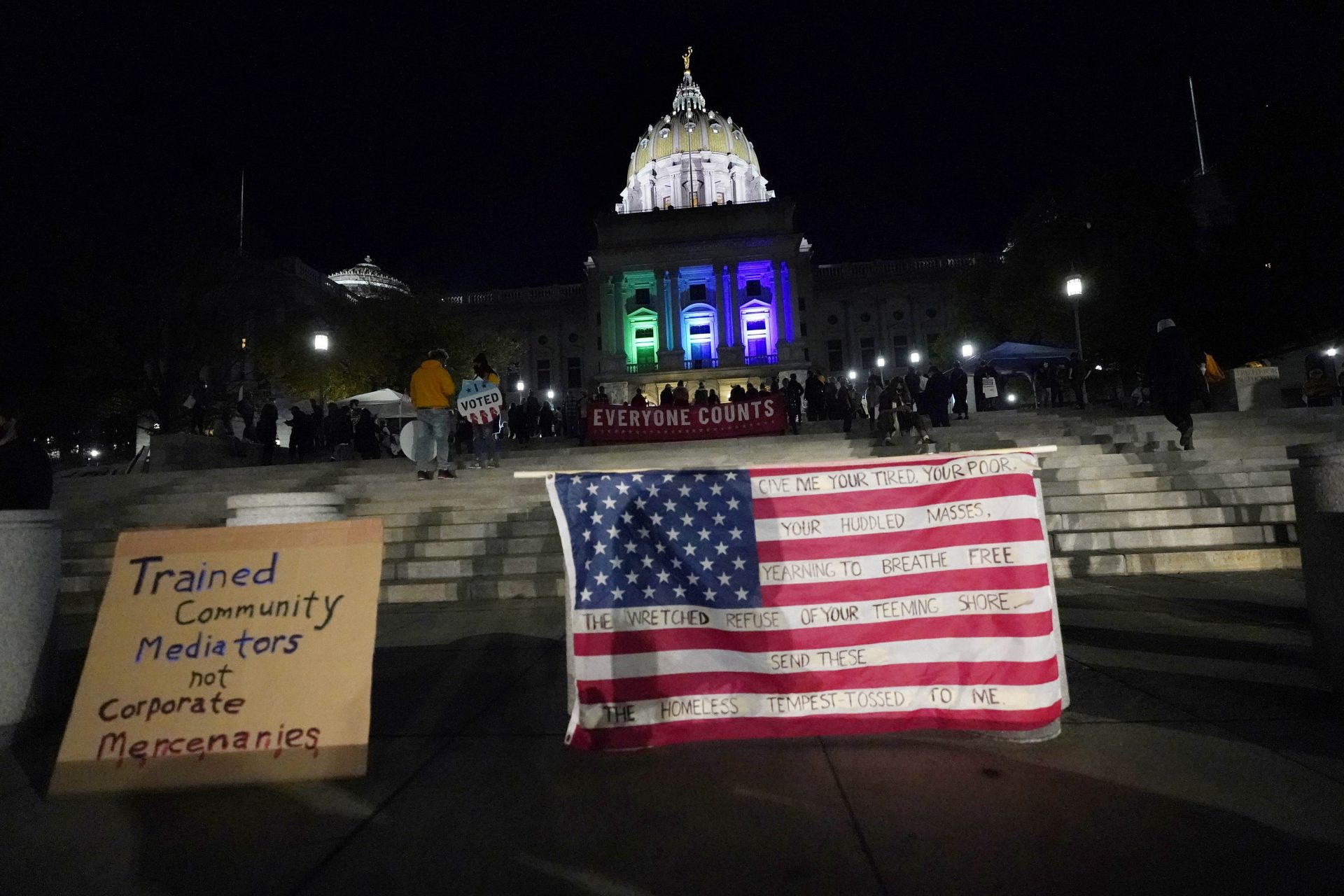 People demonstrate outside the Pennsylvania State Capitol to urge that all votes be counted, Wednesday, Nov. 4, 2020, in Harrisburg, Pa., following Tuesday's election.