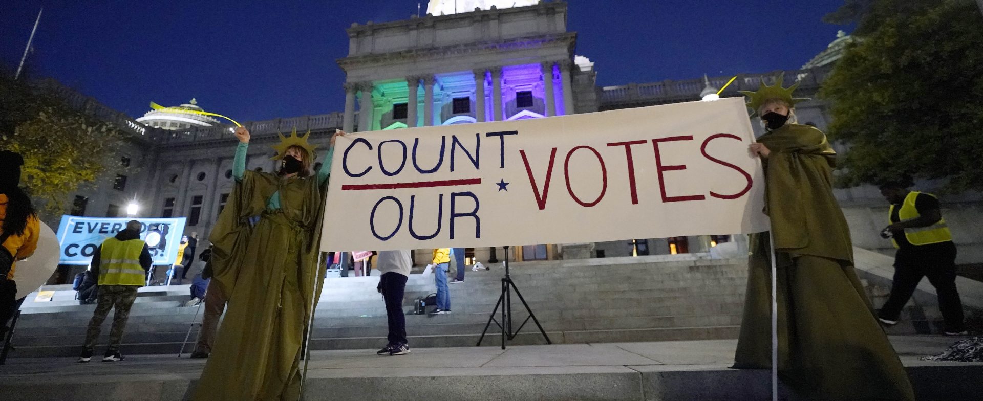 People demonstrate outside the Pennsylvania State Capitol to urge that all votes be counted, Wednesday, Nov. 4, 2020, in Harrisburg, Pa., following Tuesday's election.