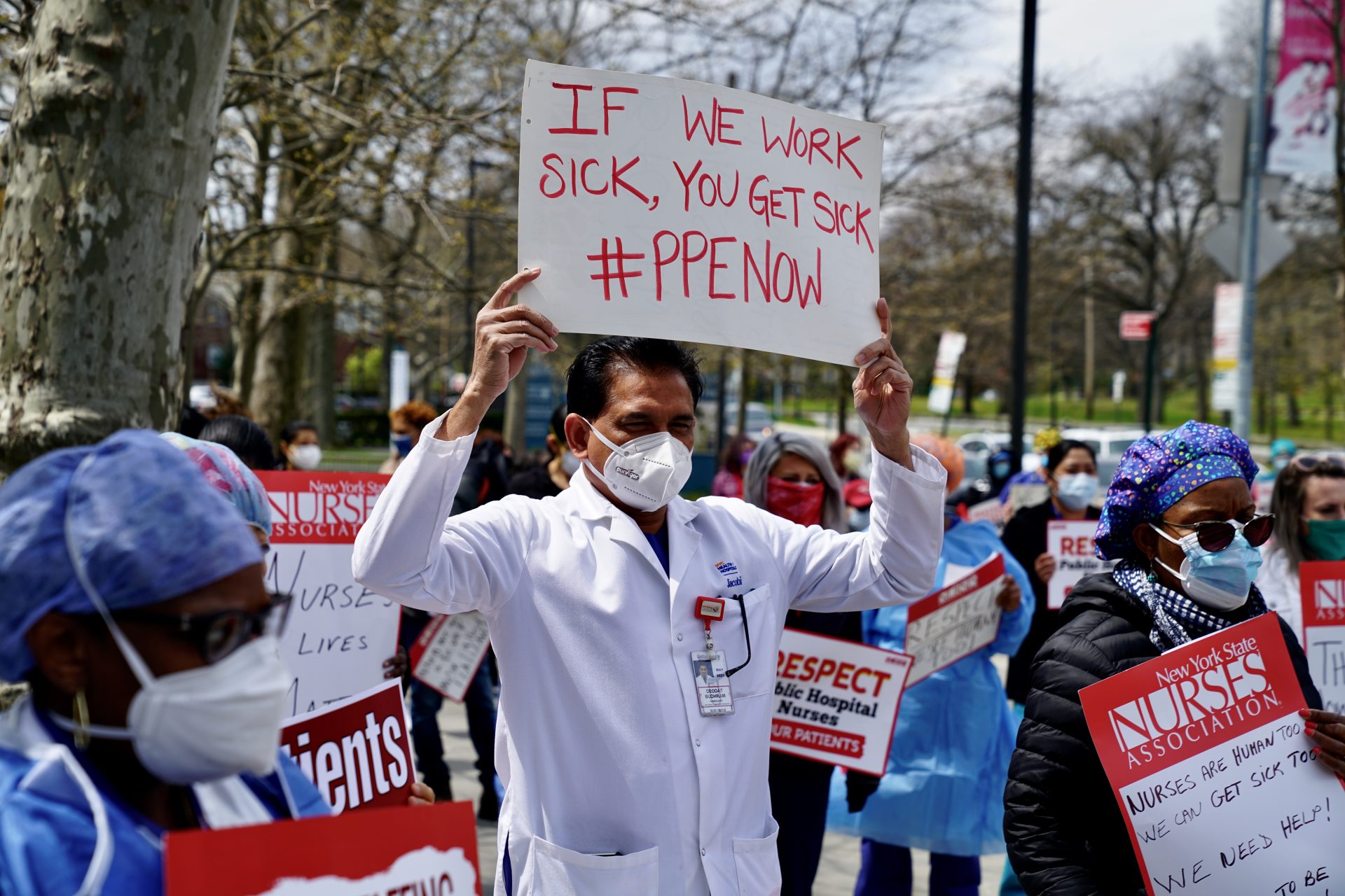 Public health workers, doctors and nurses protest a shortage of PPE outside a hospital in the Bronx on April 17, 2020, in New York, NY.