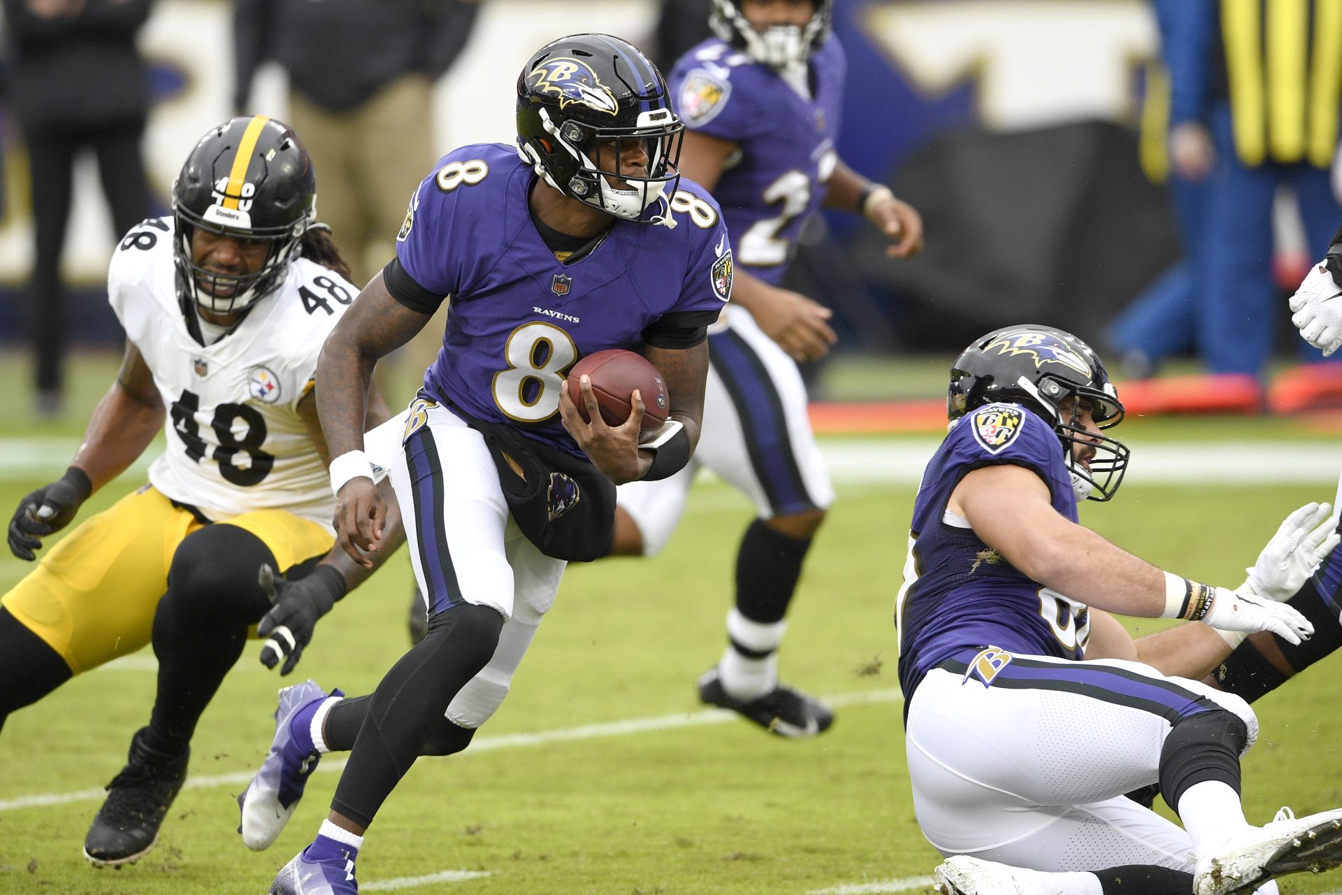 Baltimore Ravens quarterback Lamar Jackson (8) scrambles against the Pittsburgh Steelers during the first half of an NFL football game, Sunday, Nov. 1, 2020, in Baltimore.