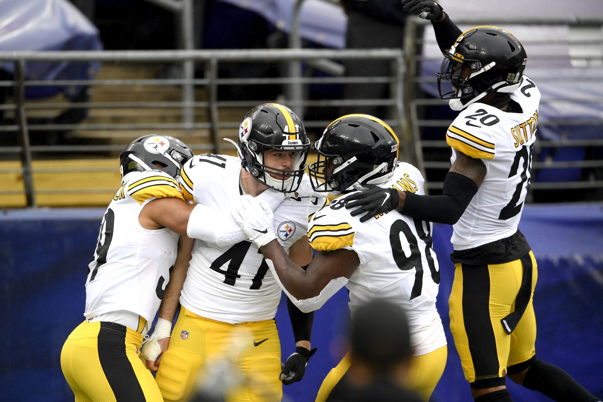Pittsburgh Steelers linebacker Robert Spillane, second from left, celebrates with teammates after after scoring on an interception of a pass from Baltimore Ravens quarterback Lamar Jackson, not visible, during the first half of an NFL football game, Sunday, Nov. 1, 2020, in Baltimore.