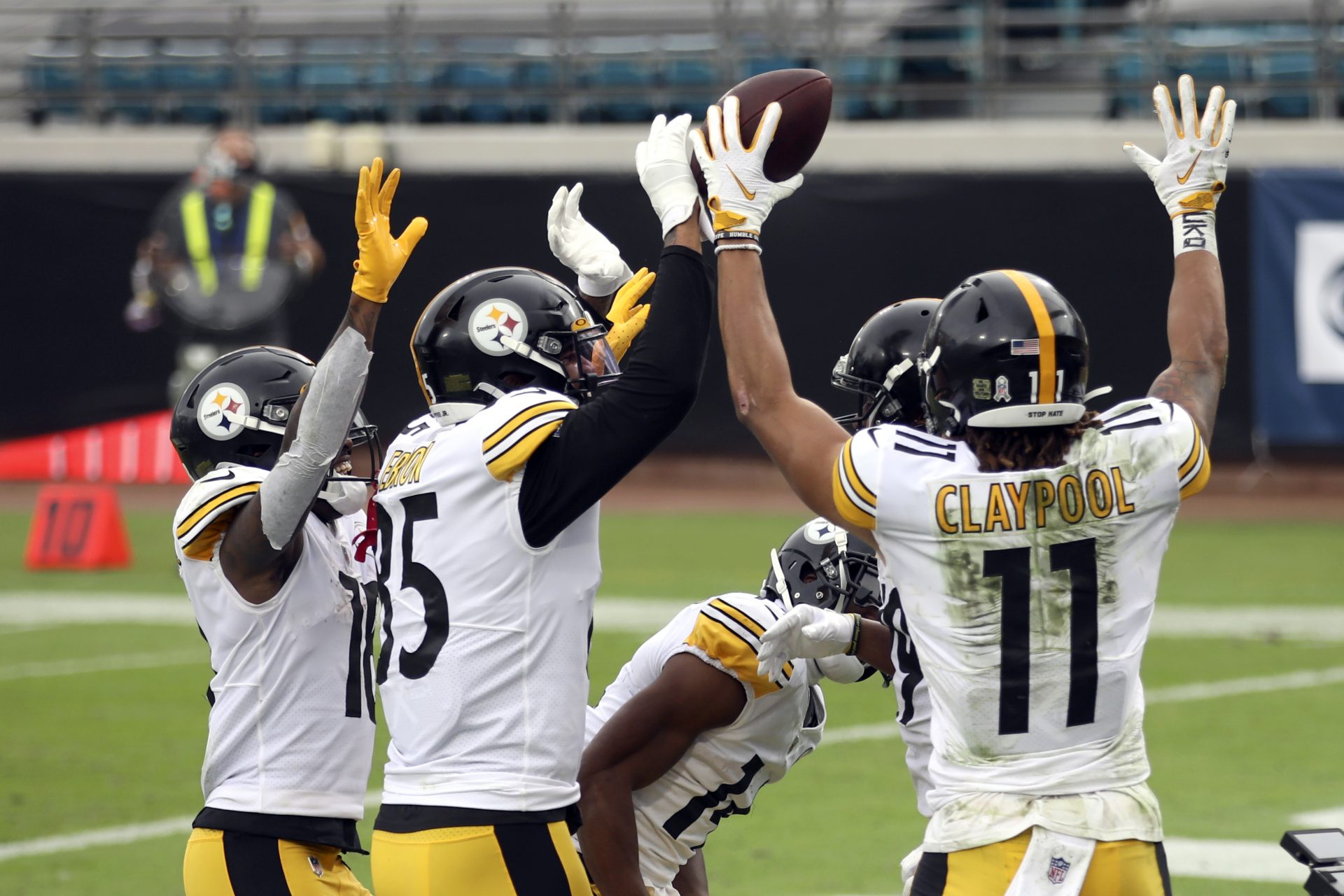 Pittsburgh Steelers players celebrate in the end zone after wide receiver Chase Claypool (11) caught a pass for a touchdown against the Jacksonville Jaguars during the first half of an NFL football game, Sunday, Nov. 22, 2020, in Jacksonville, Fla.