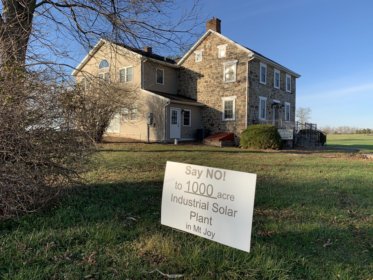 One of the many signs protesting a proposed solar project in Mount Joy Township, Adams County is seen here in front of the Iron Horse Inn on Nov. 24, 2020. Owner Tom Newhart said the project could hurt the tourism industry in the area, just outside Gettysburg. 