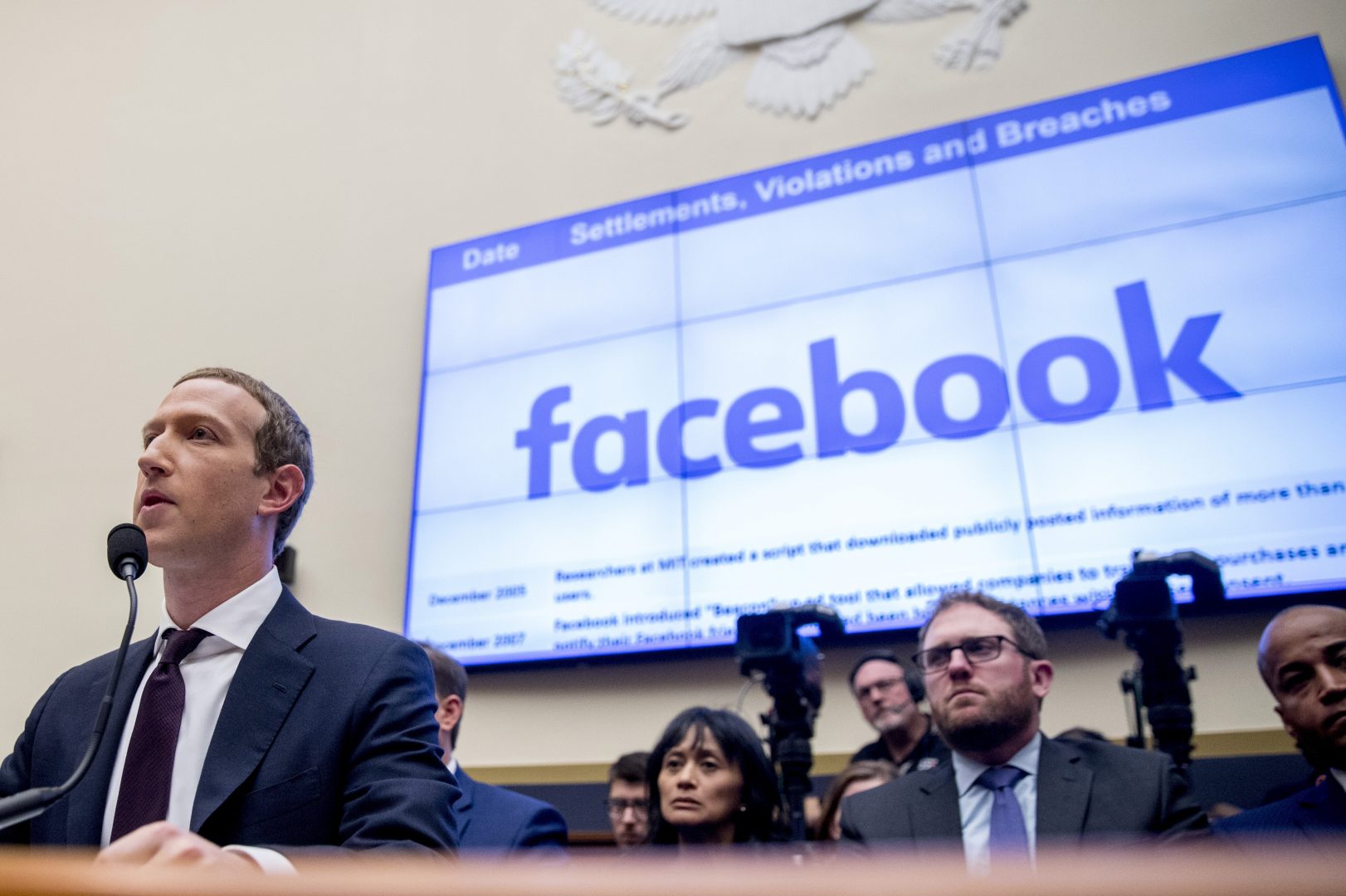 FILE PHOTO: This Oct. 23, 2019, file photo shows Facebook CEO Mark Zuckerberg testifying  before a House Financial Services Committee hearing on Capitol Hill in Washington.