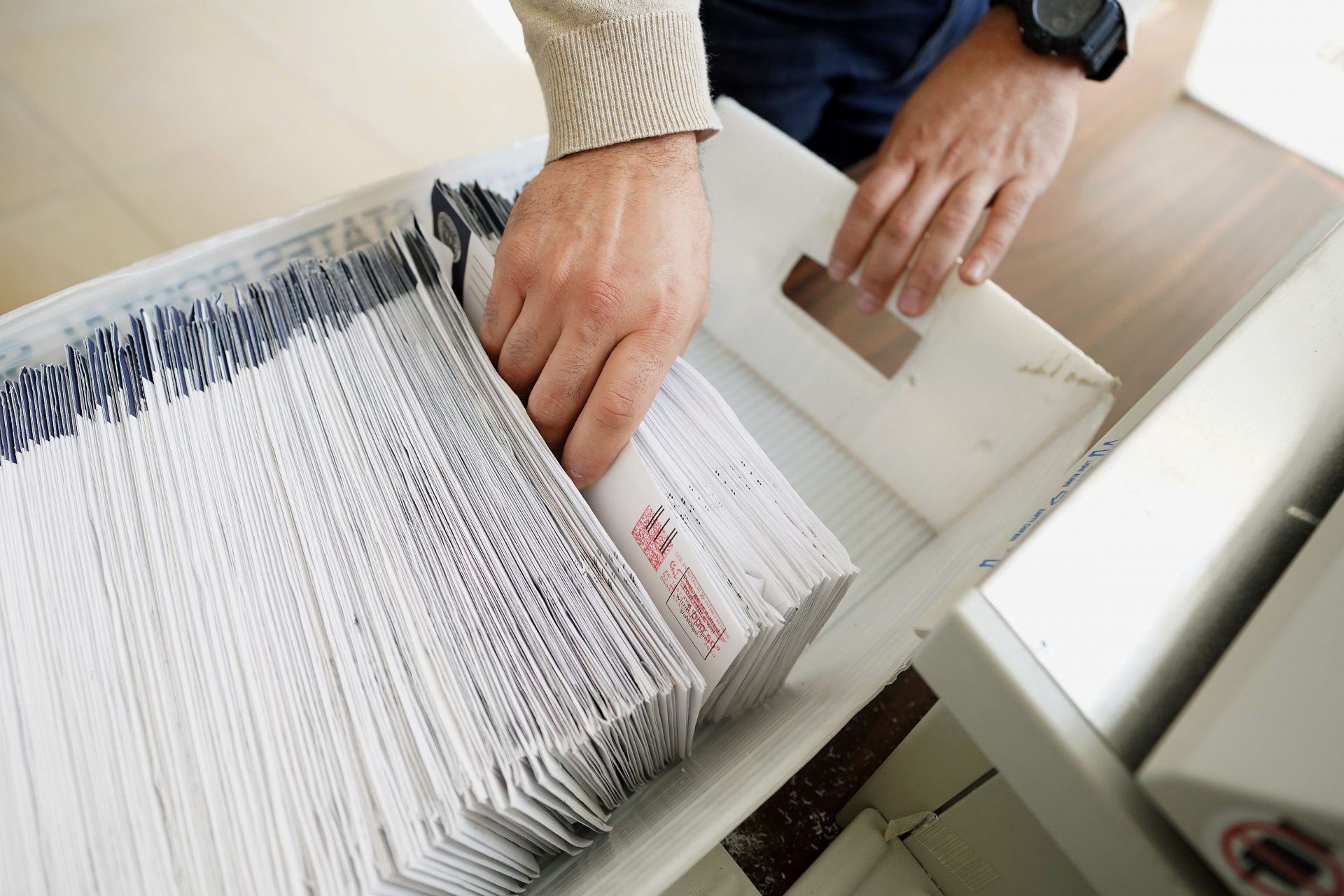 Mail-in ballots are sorted and counted by workers on Election Day in Northampton County. Pennsylvania lawmakers instituted no-excuse mail voting for the first time in 2019.