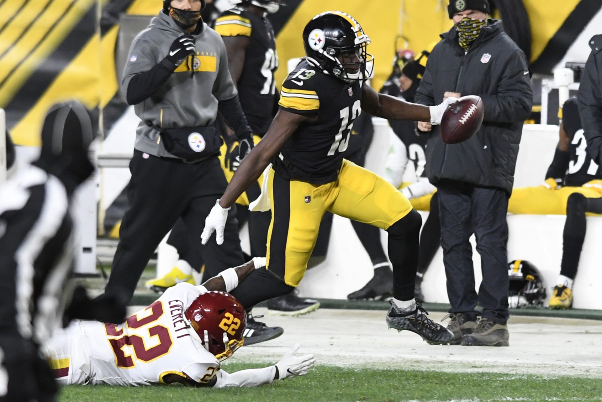 Pittsburgh Steelers wide receiver James Washington (13) gets past Washington Football Team free safety Deshazor Everett (22) after taking a pass from quarterback Ben Roethlisberger for a 50-yard touchdown play during the first half of an NFL football game in Pittsburgh, Monday, Dec. 7, 2020.