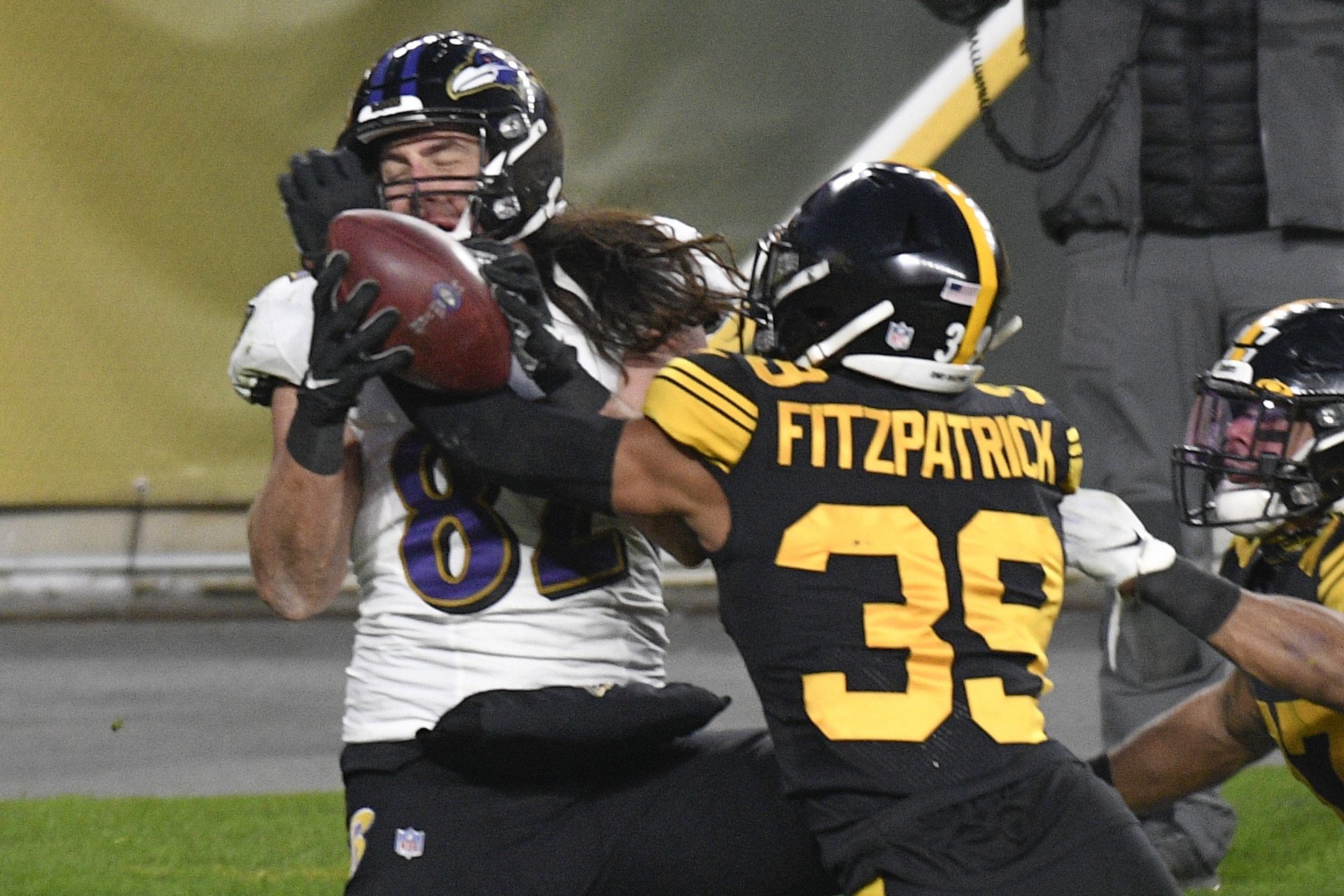 Pittsburgh Steelers free safety Minkah Fitzpatrick (39) breaks up a pass in the end zone to Baltimore Ravens tight end Luke Willson (82) as time runs out in first half of an NFL football game, Wednesday, Dec. 2, 2020, in Pittsburgh