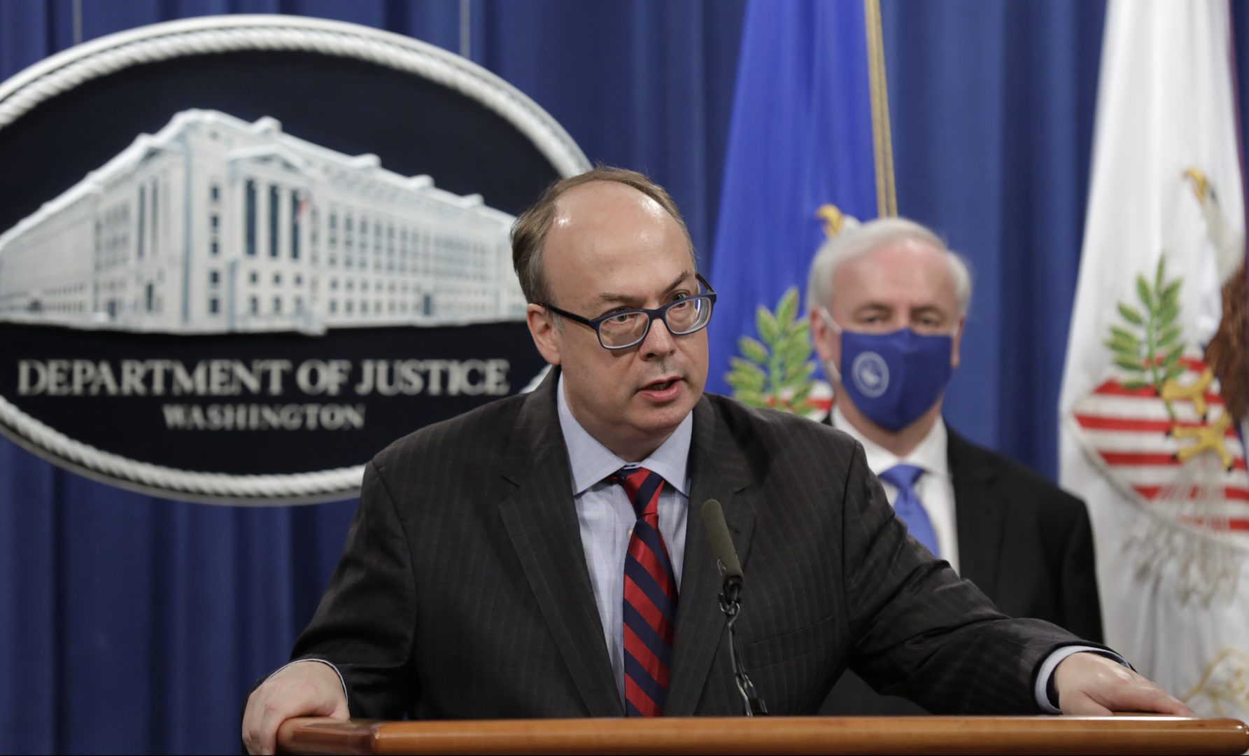 Acting Assistant U.S. Attorney General Jeffrey Clark is under scrutiny for his role in former President Donald Trump's efforts to overturn his 2020 election loss. In this file photo, Clark is shown next to Deputy Attorney General Jeffrey A. Rosen during a news conference to announce the results of the global resolution of criminal and civil investigations with an opioid manufacturer at the Justice Department in Washington, Wednesday, Oct. 21, 2020.