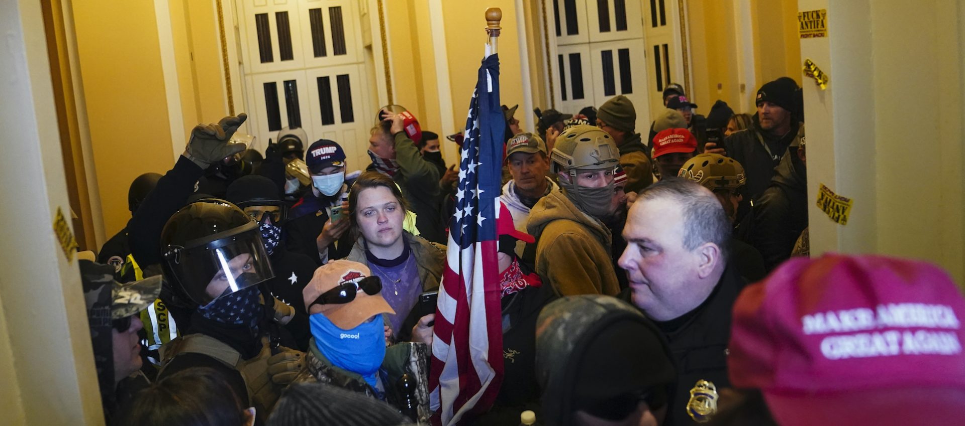 Supporters of President Donald Trump stand inside the U.S. Capitol on Wednesday, Jan. 6, 2021, in Washington.