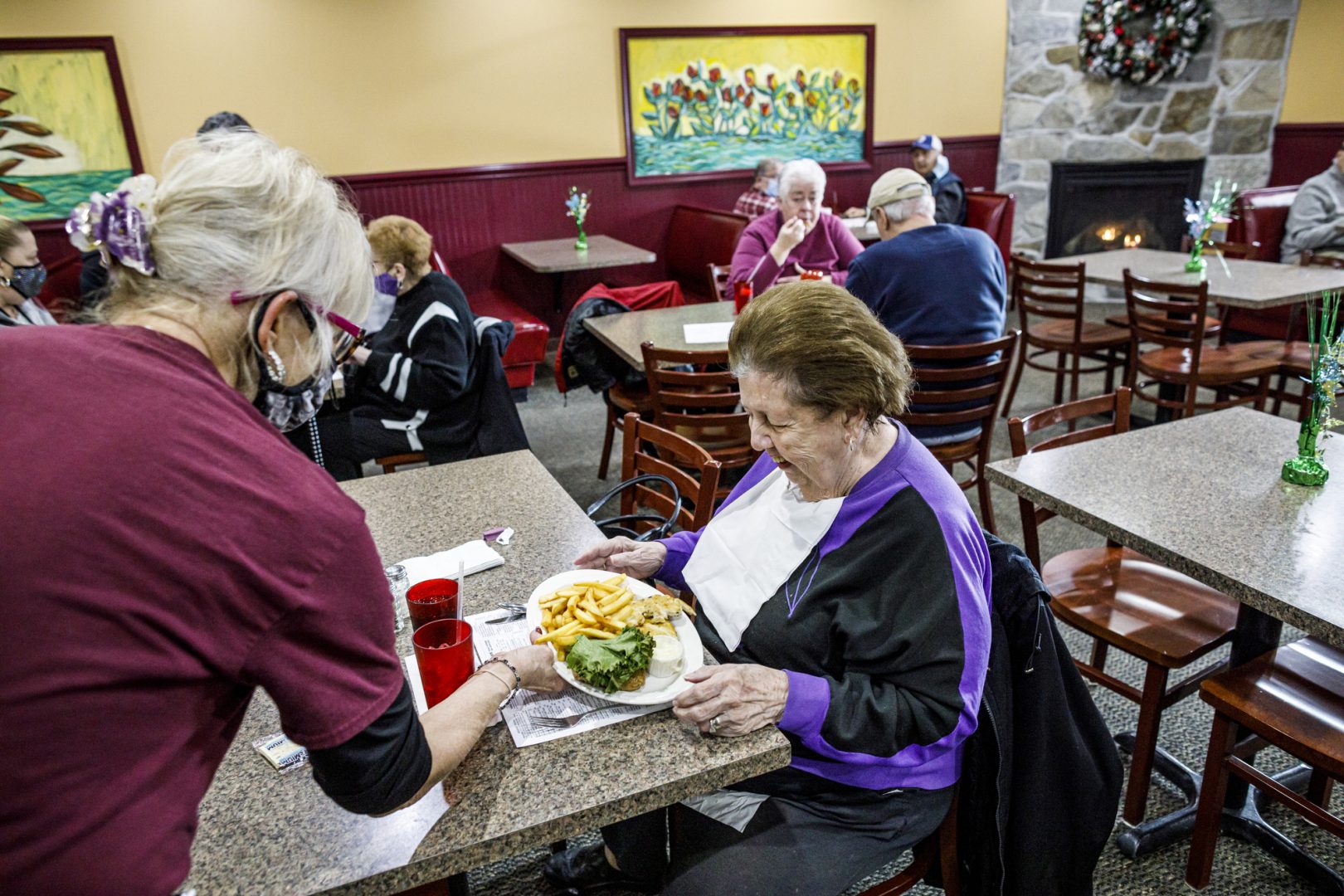Marti of Swatara Township is served her meal. Promenade Family Dining restaurant is, like all bars and restaurants that have completed the state's self certification process, now open today for indoor dining at 50 percent capacity, January 4, 2021. 