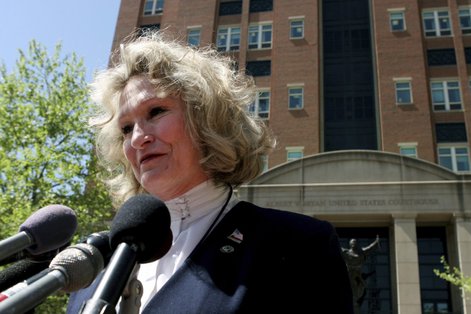In this April 20, 2006, file photo, Alice Hoagland, whose son Mark Bingham died on United Airline's Flight 93 on Sept. 11, 2001, speaks to reporters in front of U.S. District Court in Alexandria, Va. Hoagland, beloved as a mother figure by players in the global gay rugby movement her own son Mark Bingham helped establish shortly before he perished as one of the heroes of Flight 93, died Dec. 22, 2020, in her sleep at her home in California after battling Addison’s disease.
