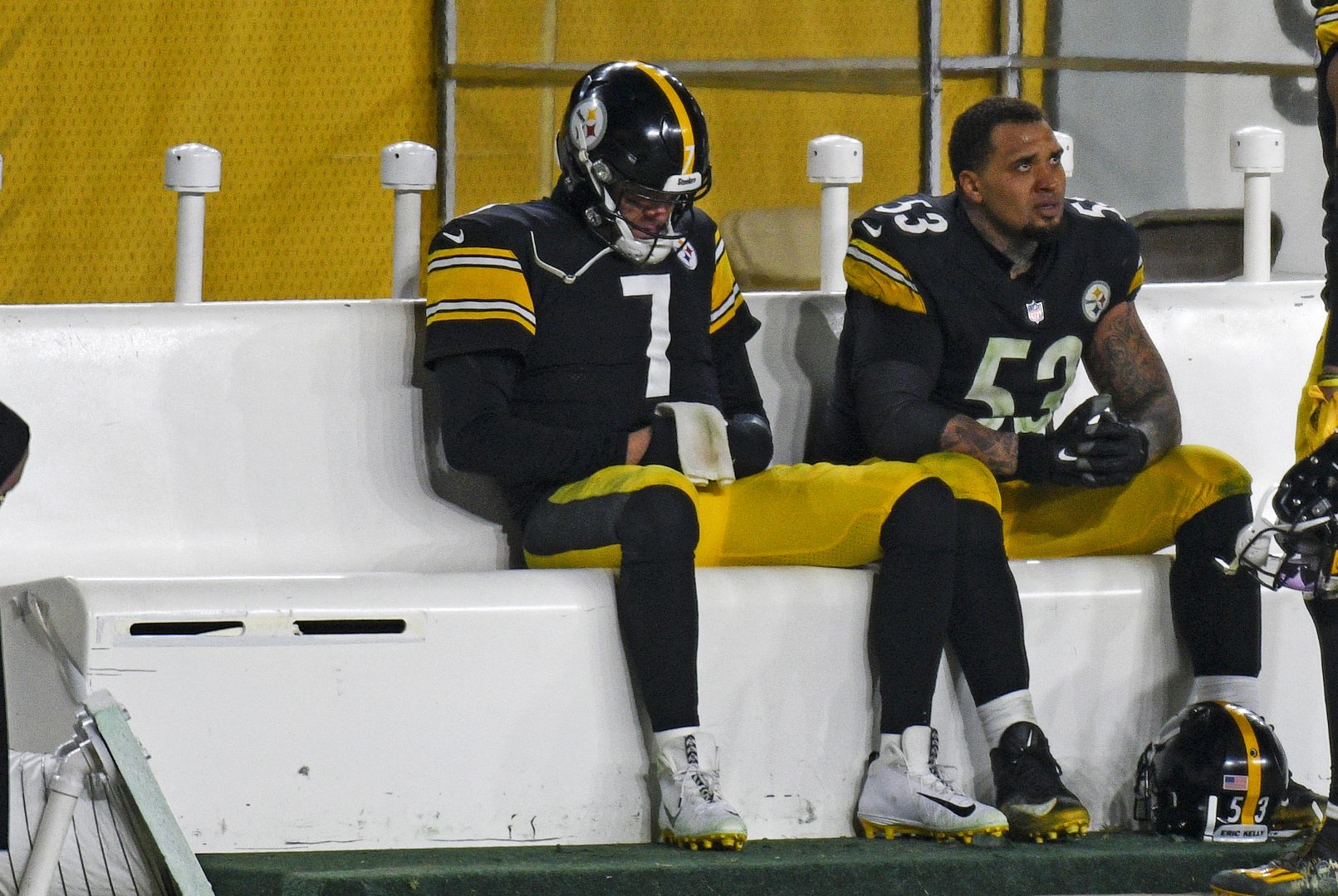 Pittsburgh Steelers quarterback Ben Roethlisberger (7) sits on the bench next to center Maurkice Pouncey (53) following a 48-37 loss to the Cleveland Browns in an NFL wild-card playoff football game in Pittsburgh, Sunday, Jan. 10, 2021. 