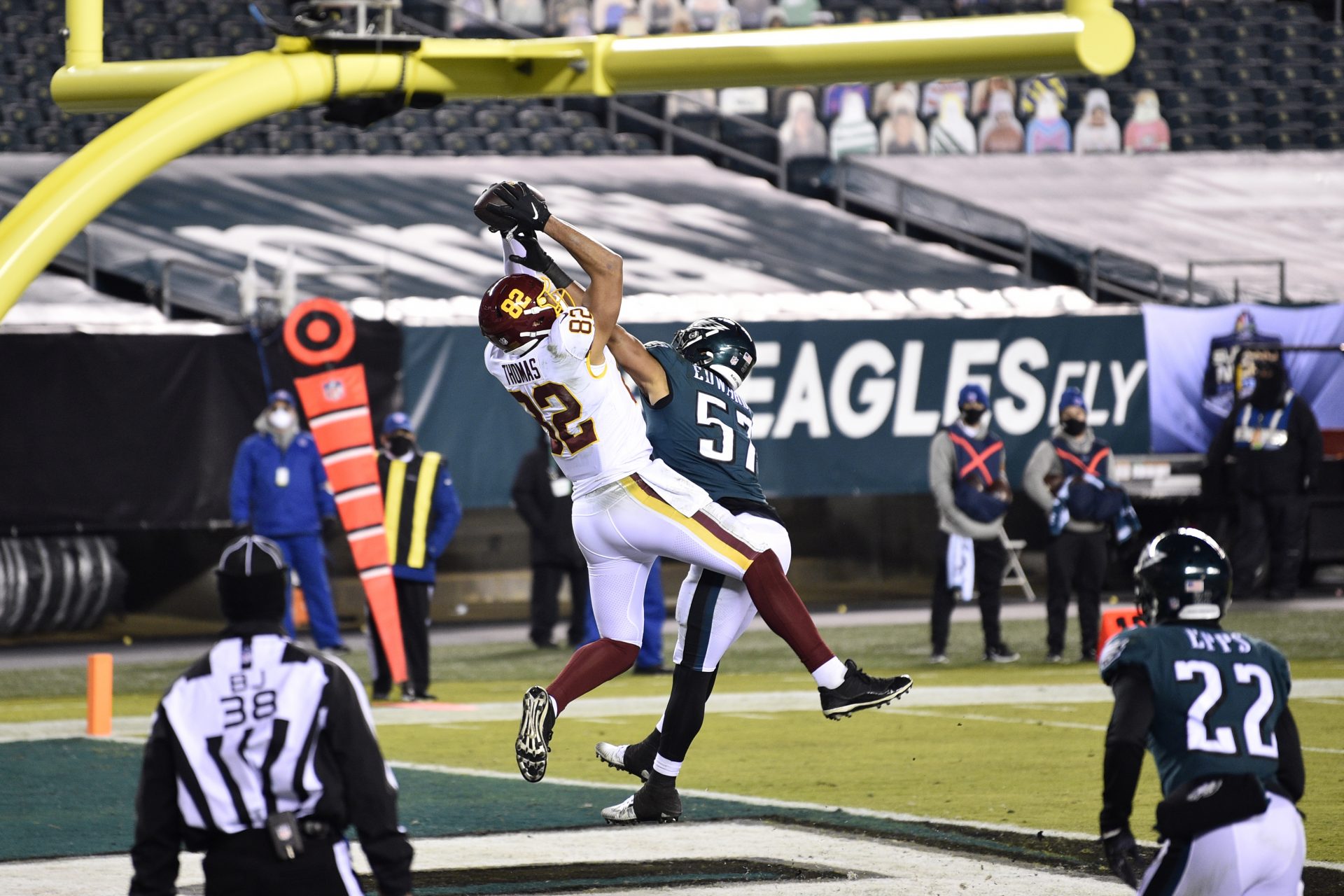 Washington Football Team's Logan Thomas (82) catches a touchdown against Philadelphia Eagles' T.J. Edwards (57) during the first half of an NFL football game, Sunday, Jan. 3, 2021, in Philadelphia.