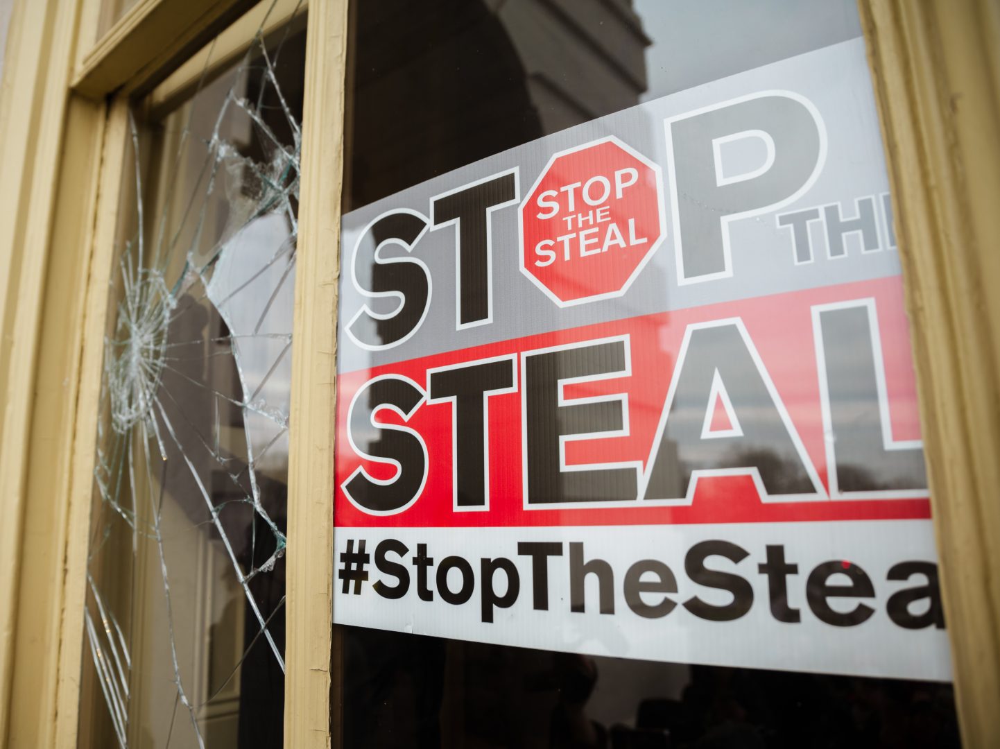 A Stop The Steal sign is posted inside the U.S. Capitol after a pro-Trump mob broke into the building on Jan. 6, 2021.