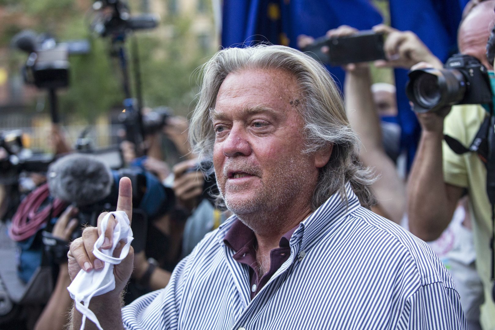In this Aug. 20, 2020, file photo, President Donald Trump's former chief strategist, Steve Bannon, speaks with reporters in New York after pleading not guilty to charges that he ripped off donors to an online fundraising scheme to build a southern border wall. Trump is expected to pardon Bannon, Wednesday, Jan. 20, 2021, as part of a flurry of last-minute clemency action that appears to be still in flux in the last hours of his presidency. 