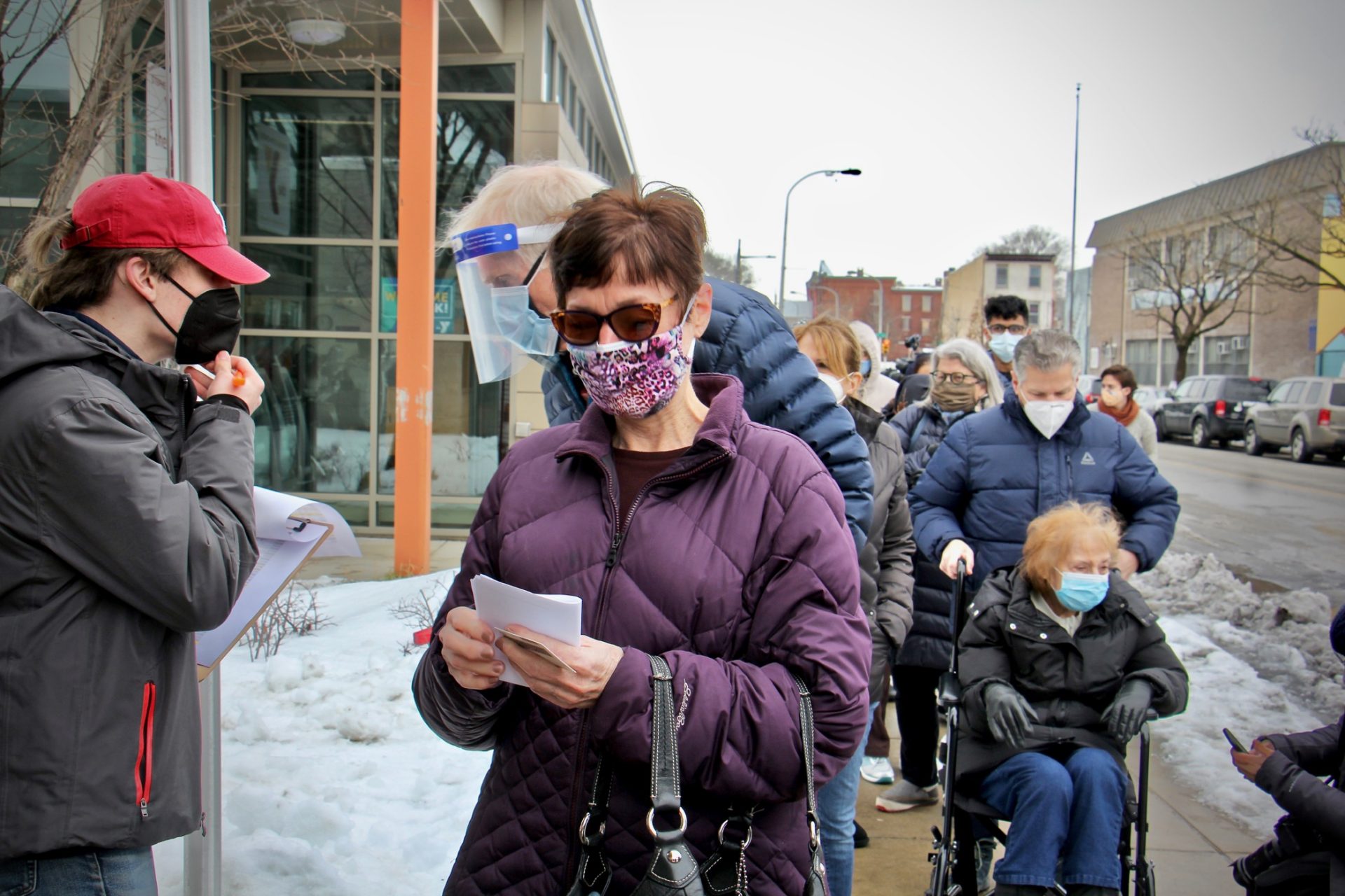Judy Salisbury, 70, of Rittenhouse Square (center) signed up on line to get her COVID-19 vaccination at Philadelphia's first standing city-run COVID-19 vaccination clinic, which opened at the Martin Luther King Jr. Older Adult Center on Cecil B. Moore Avenue, Tuesday, Feb. 23, 2021.