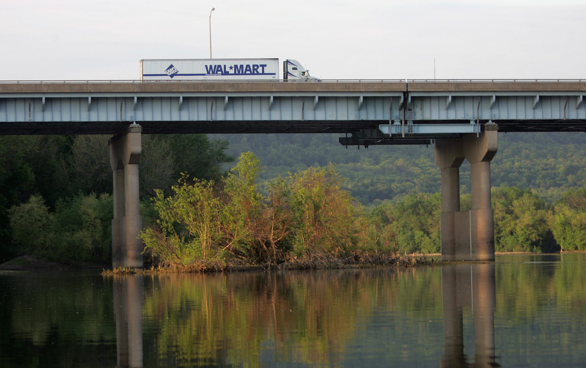 FILE PHOTO: A WalMart truck passes over the Susquehanna River on Interstate 81 in Harrisburg, Pa., Tuesday May 9, 2006.
