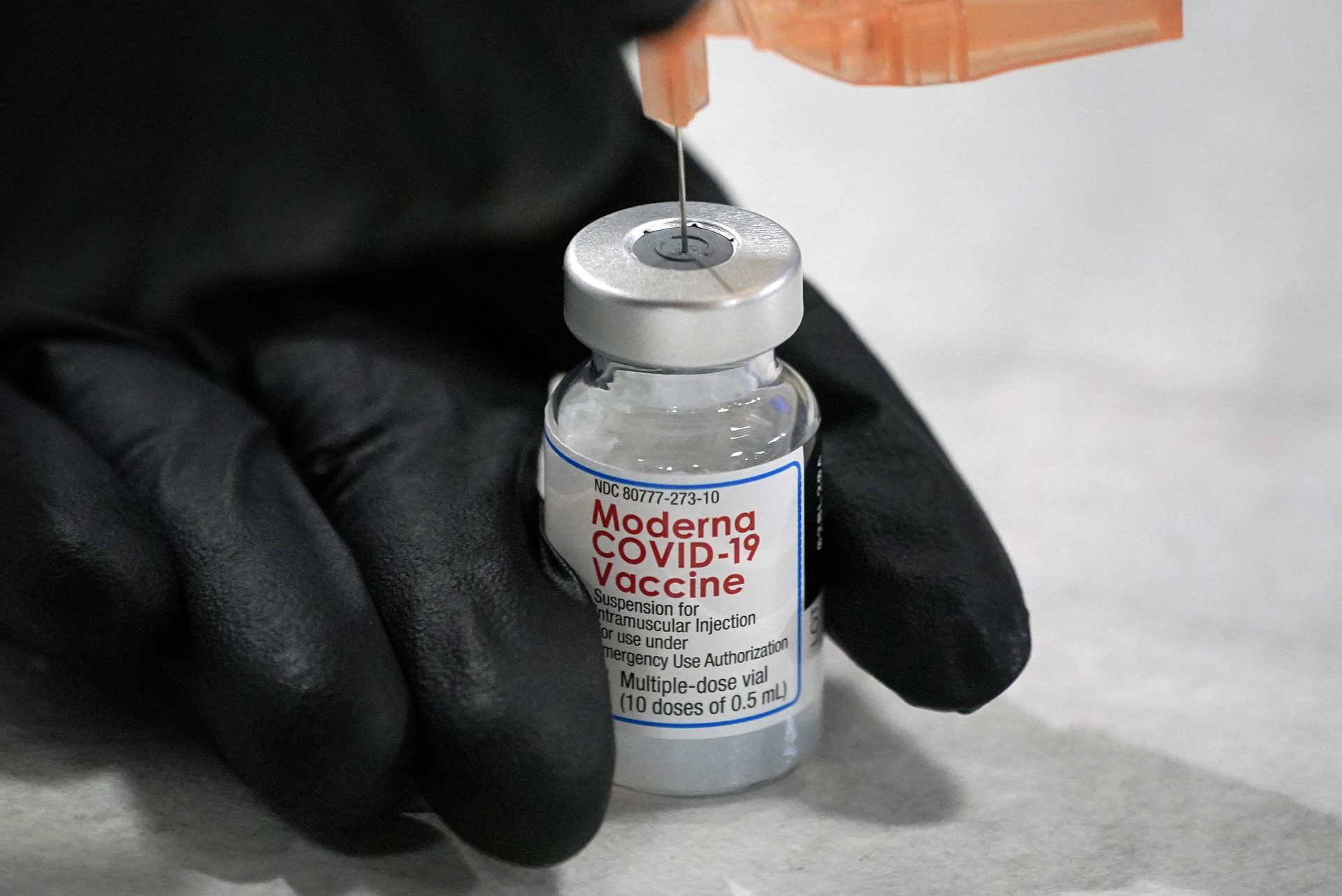 University of Pittsburgh Pharmacy student Edith Wang loads a syringe with a dose of the Moderna Covid-19 Vaccine, during a vaccination clinic hosted by the University of Pittsburgh and the Allegheny County Health Department at the Petersen Events Center, in Pittsburgh, Thursday, Jan. 28, 2021.