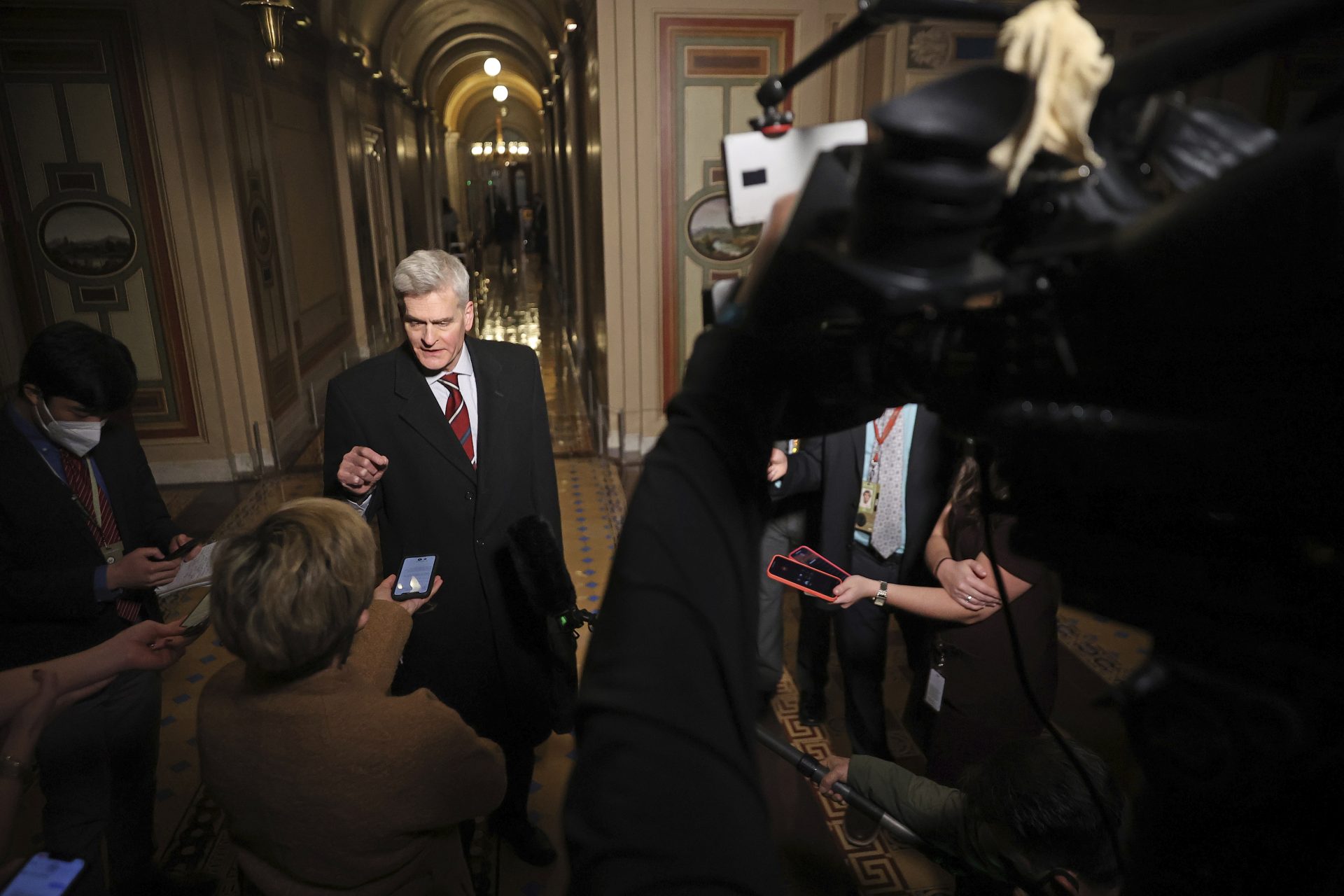 Sen. Bill Cassidy, R-La., talks with reporters as he leaves the U.S. Capitol after the first day of Trump's second impeachment trial in the Senate, Tuesday, Feb. 9, 2021, in Washington.