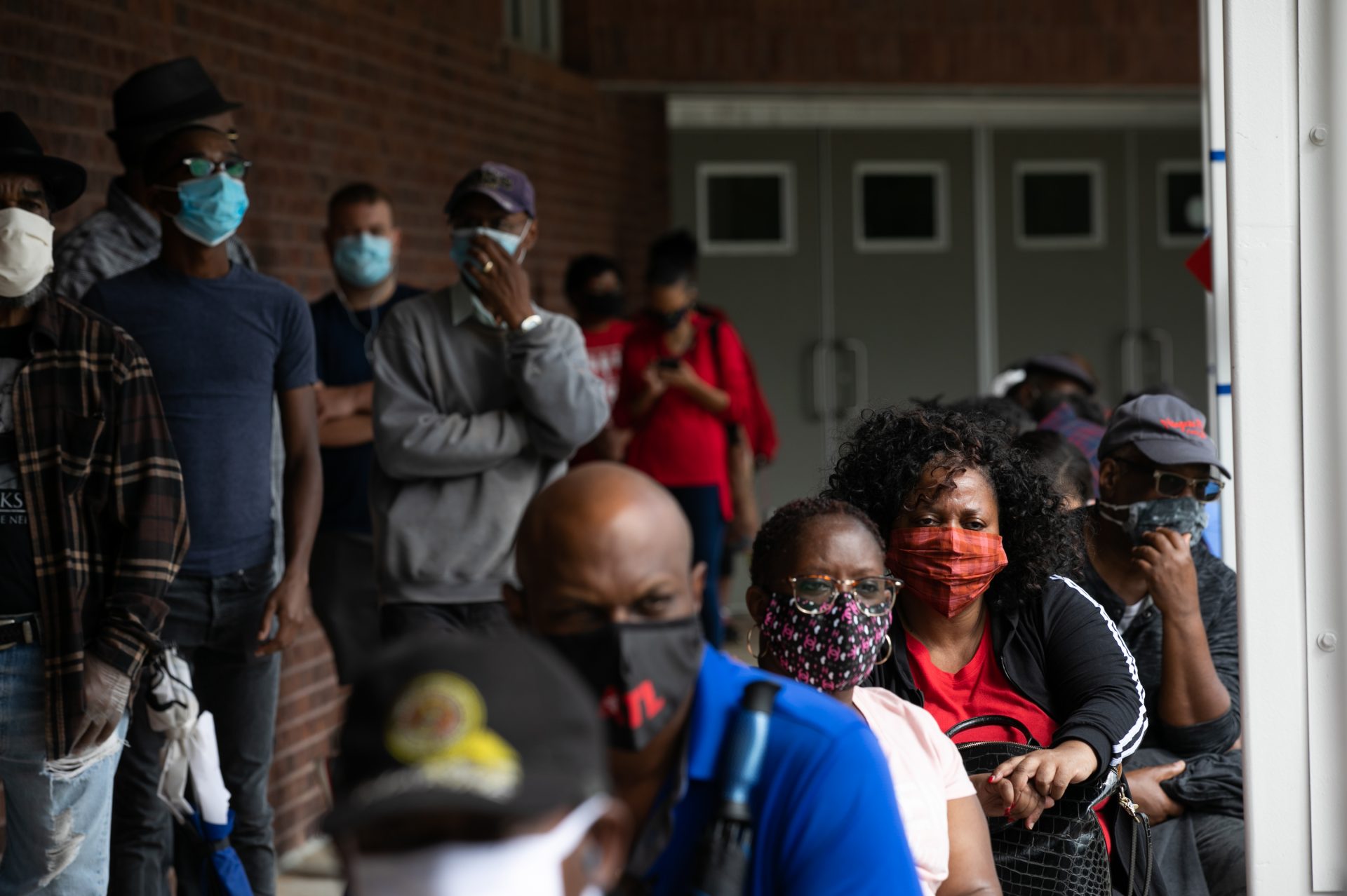 People wait in line on the first day of early voting for the 2020 general election on Oct. 12 in Atlanta.