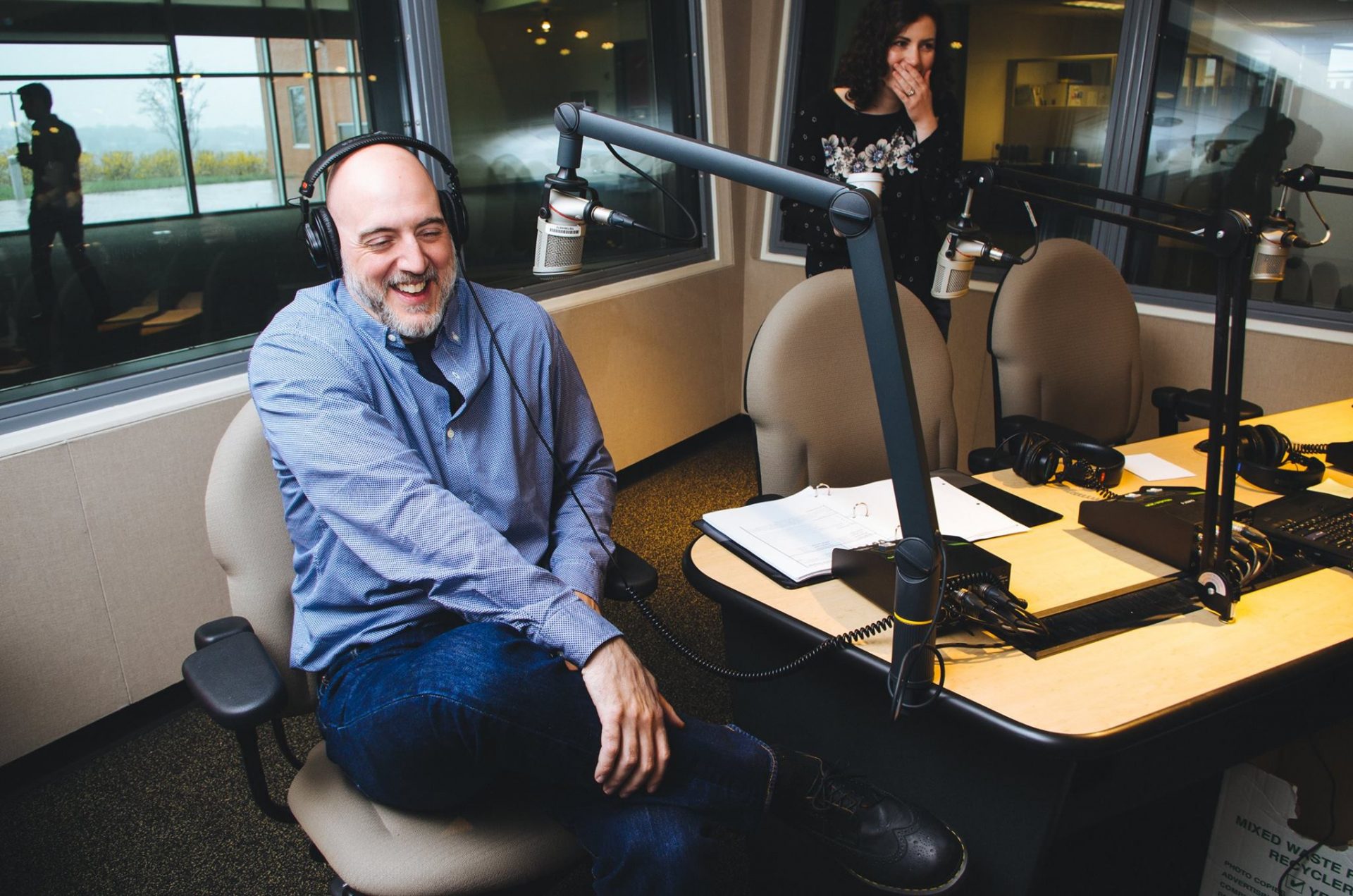 WITF Multimedia News Director Tim Lambert and StateImpact Pennsylvania reporter Marie Cusick laugh in the master control room in April 2016.