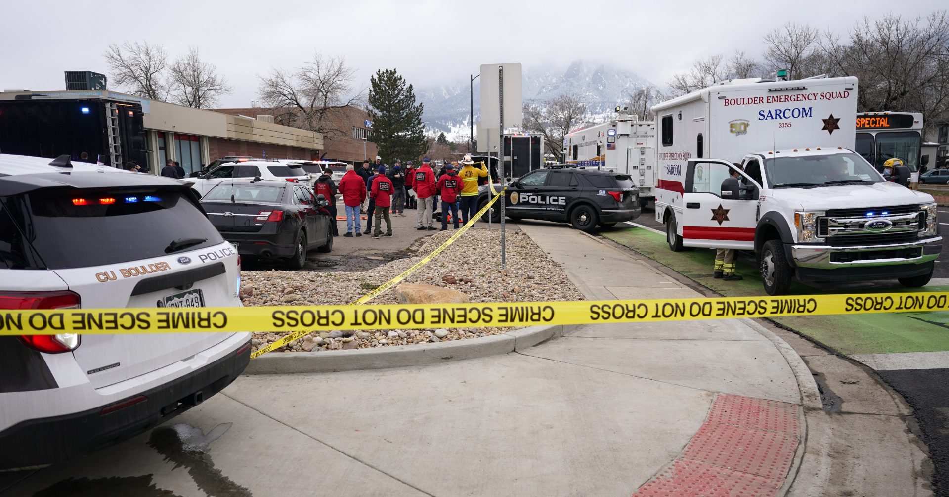 Police work on the scene outside a King Soopers grocery store where a shooting took place Monday, March 22, 2021, in Boulder, Colo.