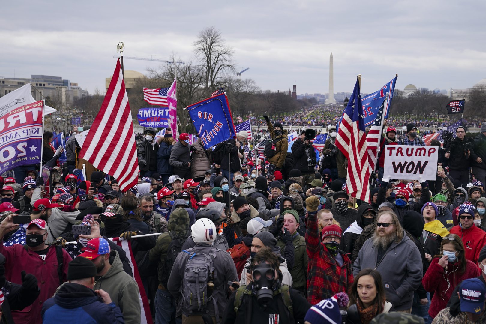 Pro-Trump insurrectionists gather outside the Capitol, Wednesday, Jan. 6, 2021, in Washington.