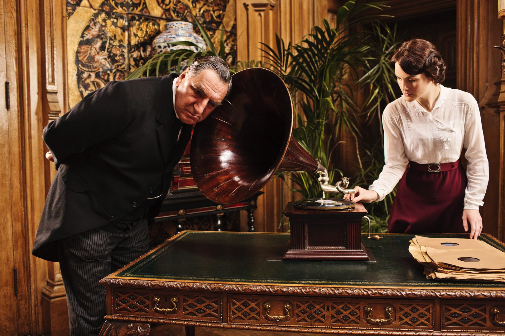 From Downton Abbey Season 2.  Shown from L-R: Jim Carter as Mr. Carson and Michelle Dockery as Lady Mary