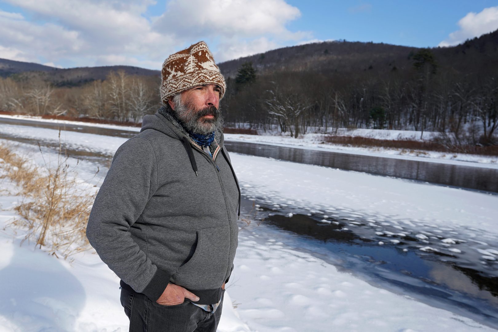 Steve Schwartz stands on his property right along the Delaware River in Equinunk, Pennsylvania. 