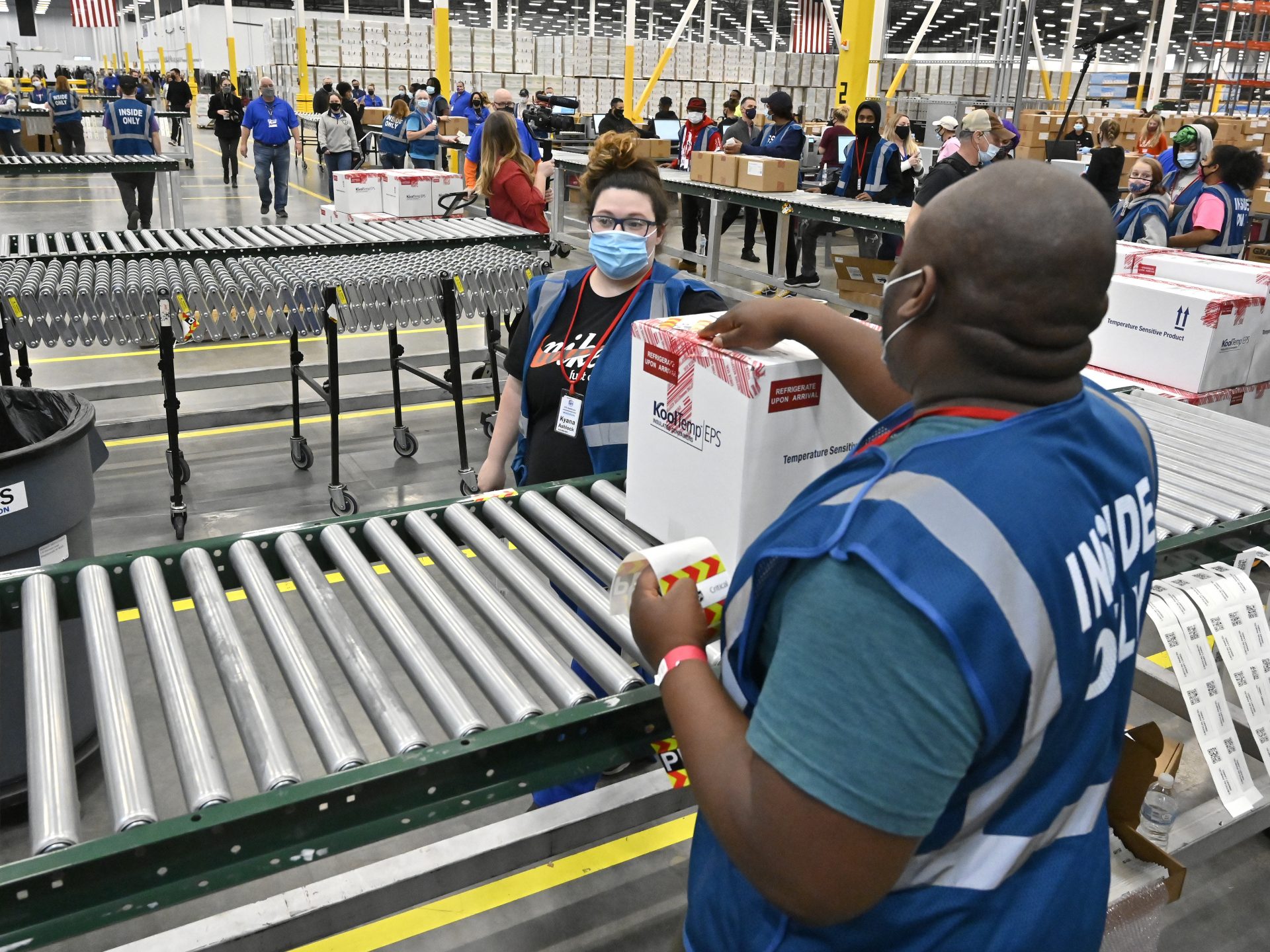 The first box of the Johnson & Johnson COVID vaccine departs from the McKesson facility in Shepherdsville, Kentucky on Monday. The company is set to distribute its first 3.9 million doses across the country this week.