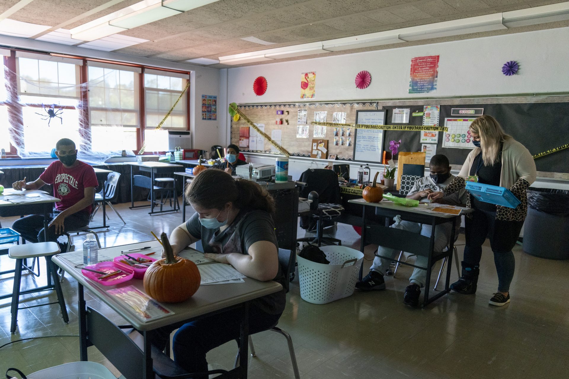 Marissa De Gaetano, right, teaches an autism class at Roosevelt High School - Early College Studies, Thursday, Oct. 15, 2020, in Yonkers, N.Y.