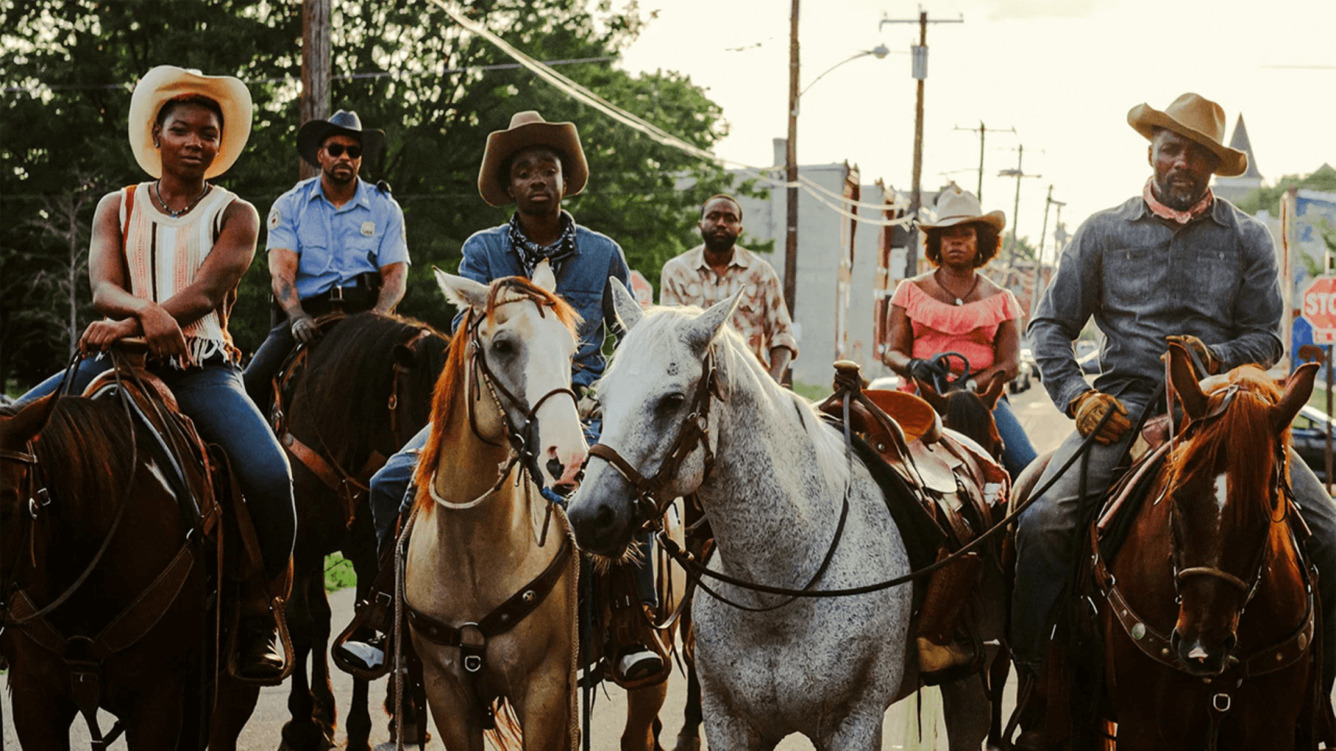 This image released by Netflix shows, from left, Ivannah-Mercedes, Lorraine Toussaint, Idris Elba, Caleb McLaughlin, Jamil "Mil" Prattis and Cliff "Method Man" Smith in a scene from "Concrete Cowboys."