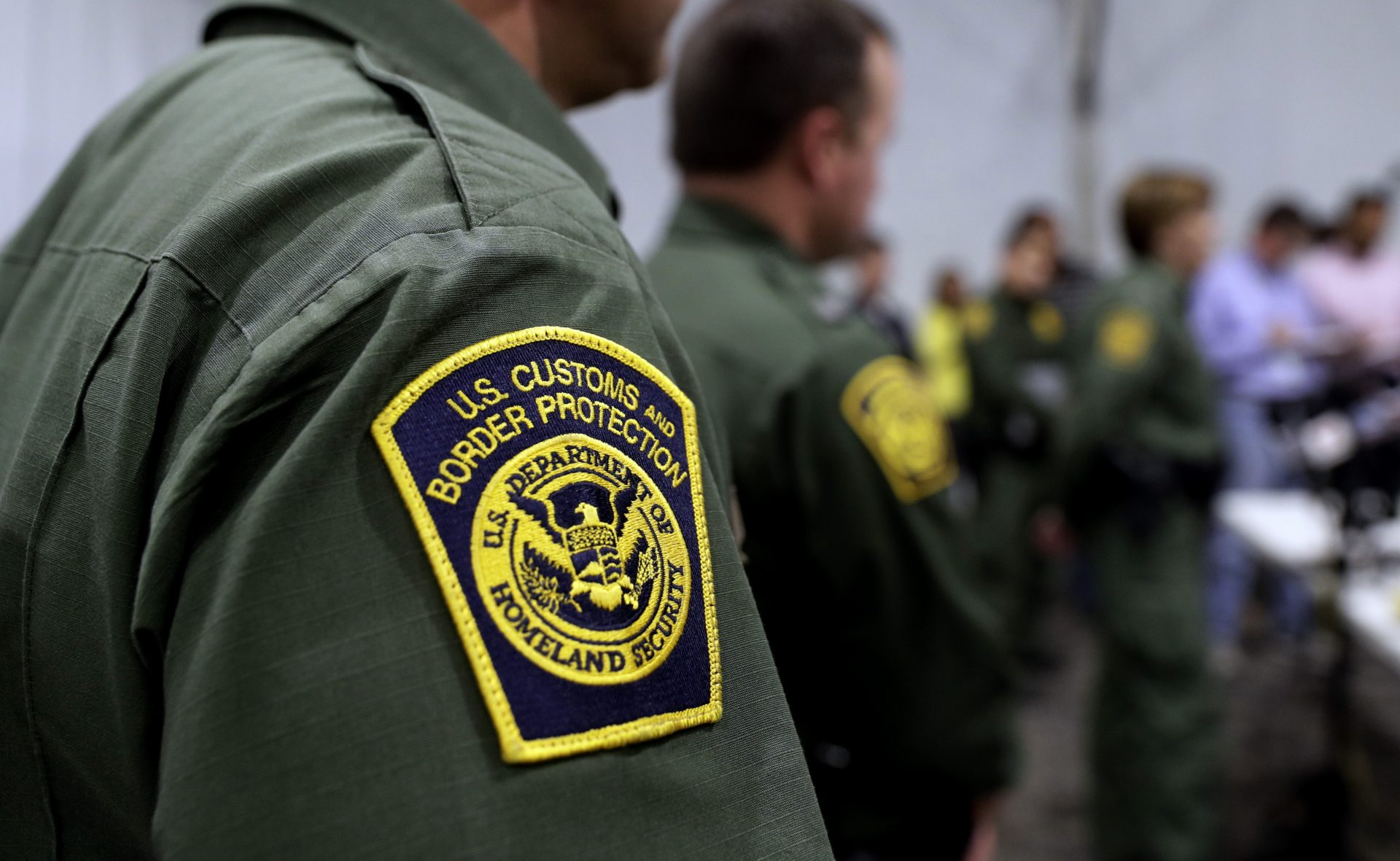 In this Thursday, May 2, 2019 file photo, Border Patrol agents hold a news conference prior to a media tour of a new U.S. Customs and Border Protection temporary facility near the Donna International Bridge in Donna, Texas