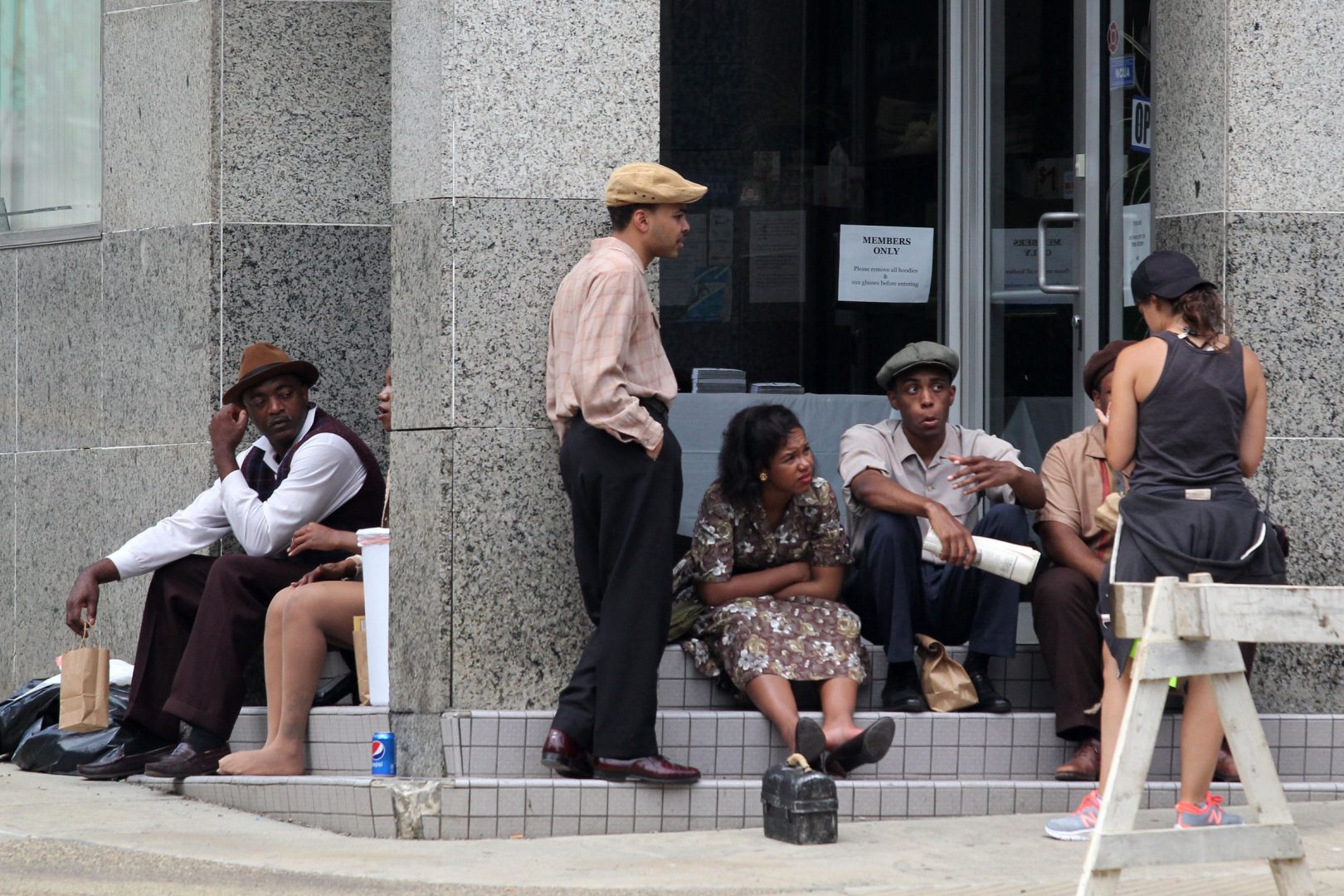 Extras wait between scenes during the filming Denzel Washington's adaptation of August Wilson's 