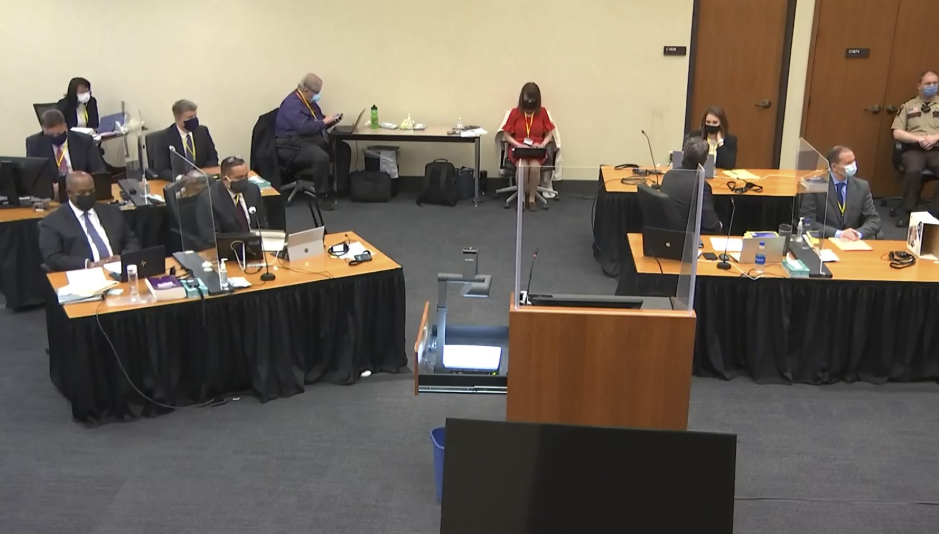 In this image from video, the court listens as Hennepin County Judge Peter Cahill presides over pre-trial motions prior to opening statements, Monday, March 29, 2021, in the trial of former Minneapolis police officer Derek Chauvin, in the May 25, 2020, death of George Floyd at the Hennepin County Courthouse in Minneapolis, Minn.