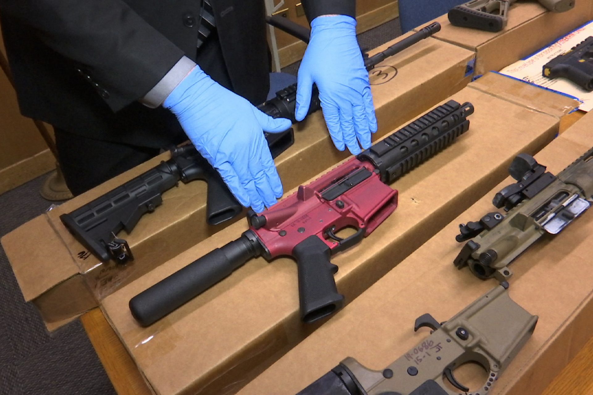 n this photo taken Wednesday, Nov. 27, 2019, is Sgt. Matthew Elseth with "ghost guns" on display at the headquarters of the San Francisco Police Department in San Francisco.