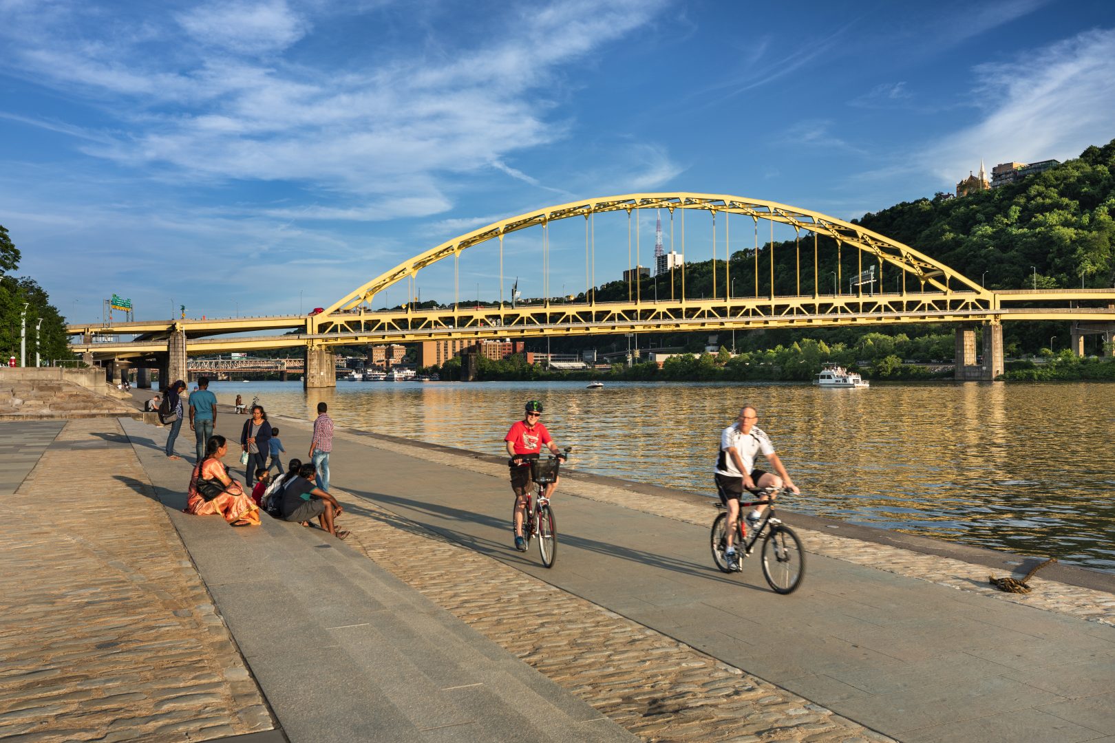 Pittsburgh, Pennsylvania - June 23 2019:  People walk along the Three Rivers Heritage Trail by Fort Duquesne in downtown Pittsburgh Pennsylvania USA
