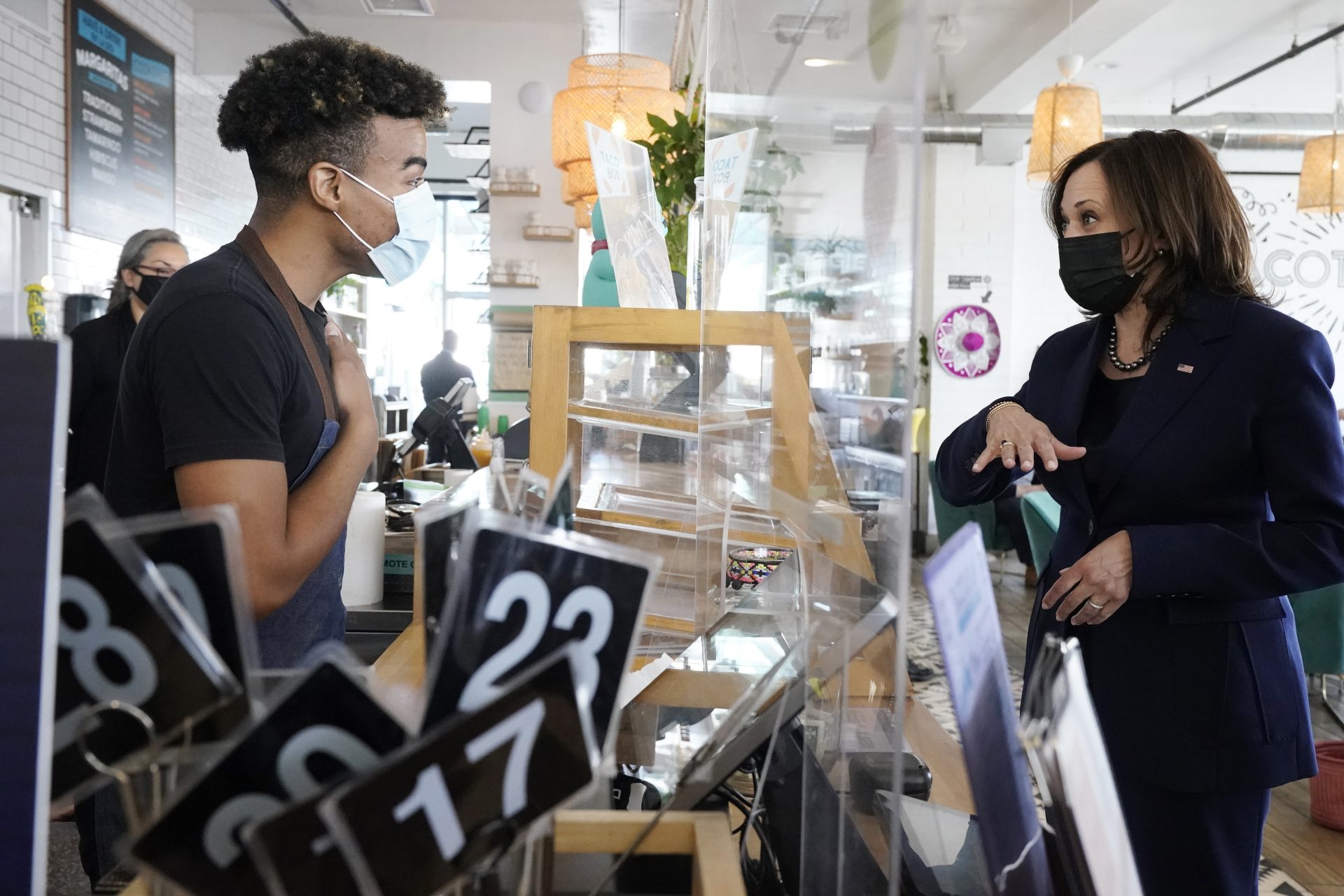 Vice President Kamala Harris gives her order to Germaine Turnbow, while stopping for lunch at Tacotarian, Monday March 15, 2021, in Las Vegas.