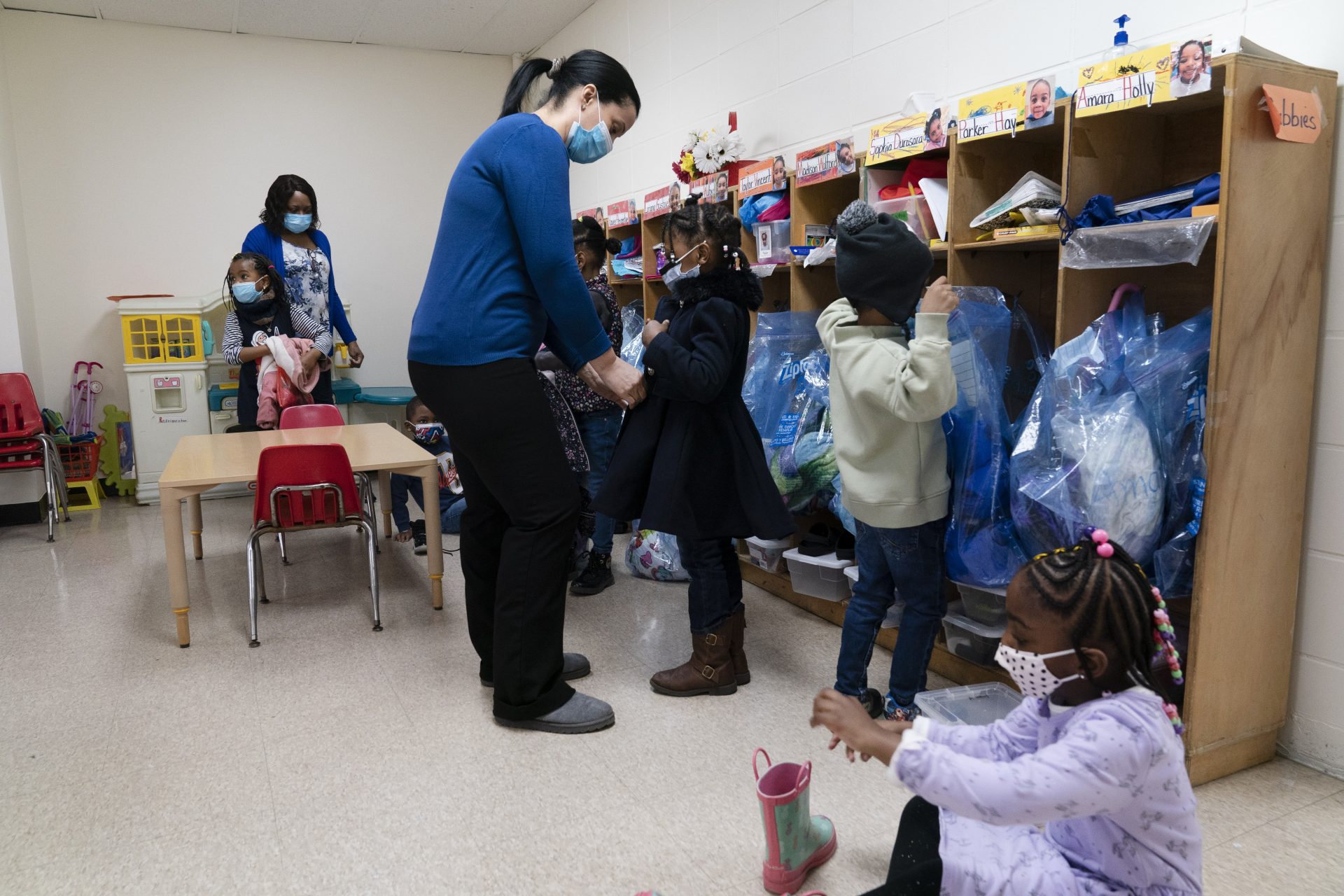 Pre-K students arrive for the school day at Phyl's Academy, Wednesday, March 24, 2021 in the Brooklyn borough of New York.