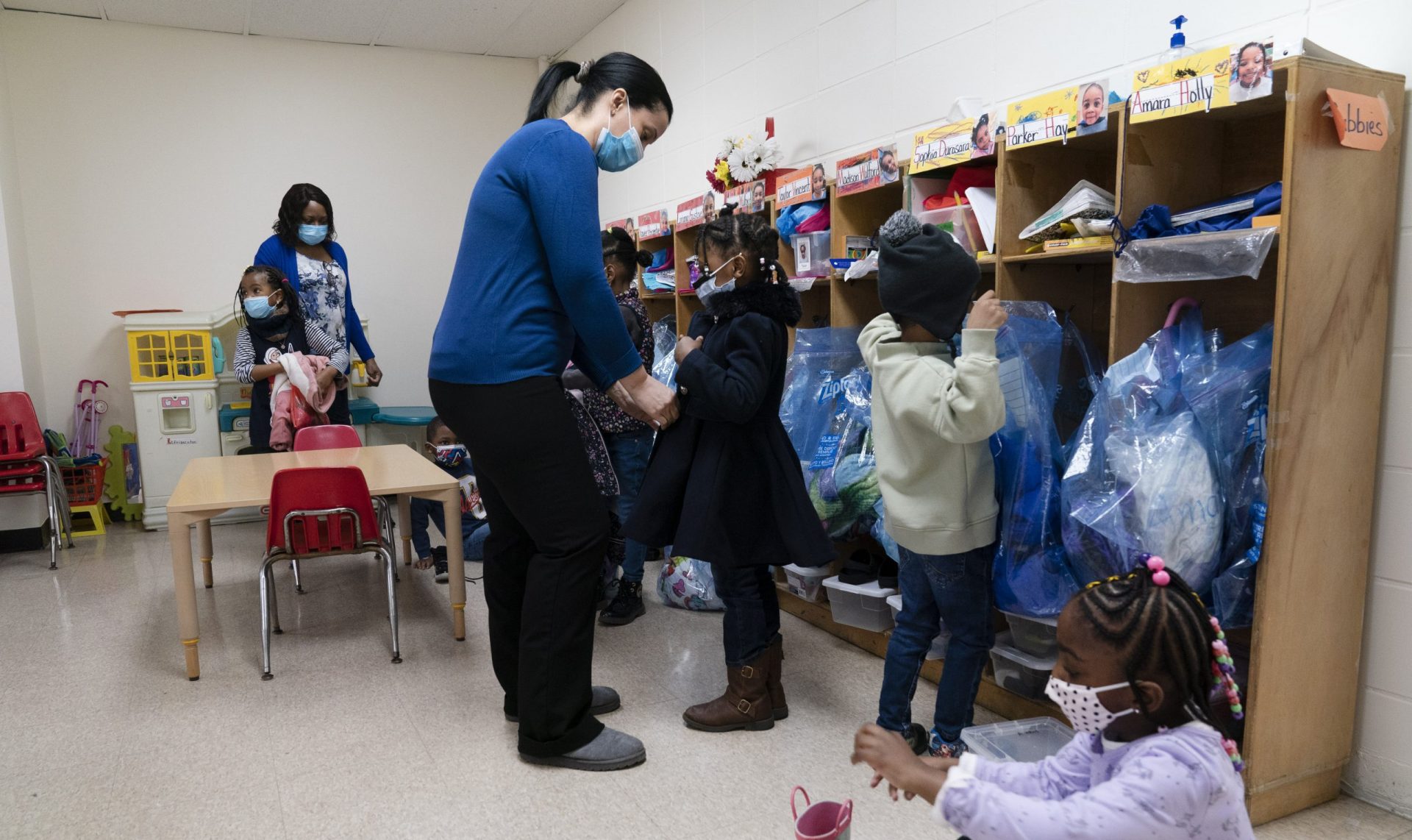 Pre-K students arrive for the school day at Phyl's Academy, Wednesday, March 24, 2021 in the Brooklyn borough of New York.