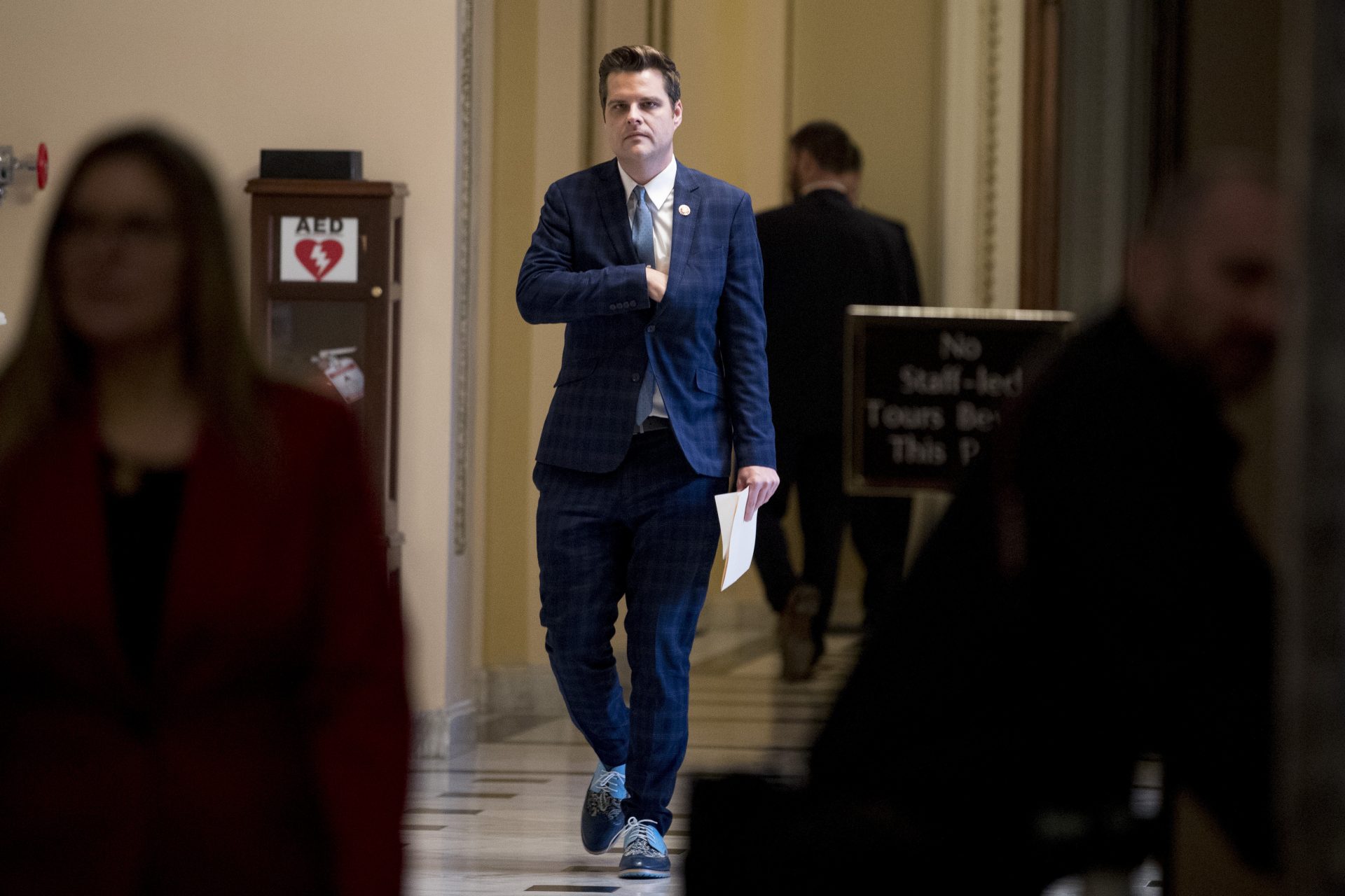 Rep. Matt Gaetz, R-Fla., walks off the House floor as House of Representatives takes up articles of impeachment against President Donald Trump, Wednesday, Dec. 18, 2019, on Capitol Hill in Washington.