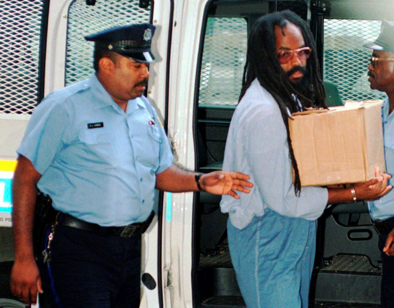 In this July 25, 1995 file photo, Mumia Abu-Jamal, convicted of killing a policeman, arrives at Philadelphia's City Hall. 