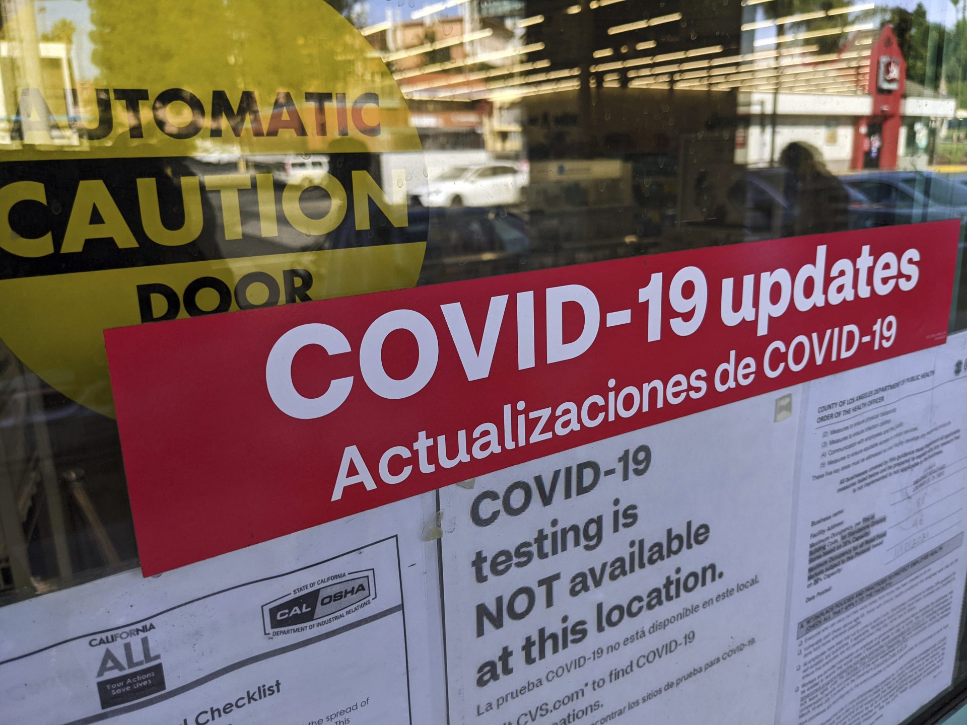 A sign is posted "COVID-19 testing in NOT available at this location," on the doors of a CVS pharmacy in Los Angeles Wednesday, Feb. 3, 2021. 