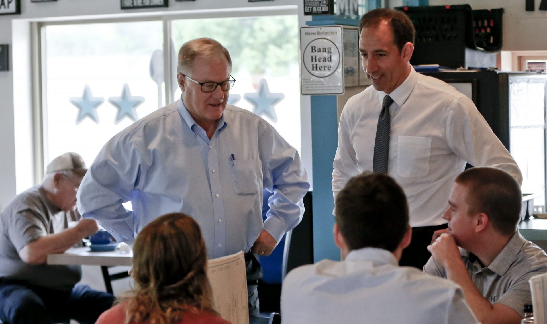 Scott Wagner, left, Republican candidate for Pennsylvania Governor, and lieutenant governor candidate Jeff Bartos, right, campaign at a diner in Imperial, Pa. Monday, May 14, 2018 , the day before the Pennsylvania primary where he faces two other Republicans, Paul Mango and Laura Ellsworth.