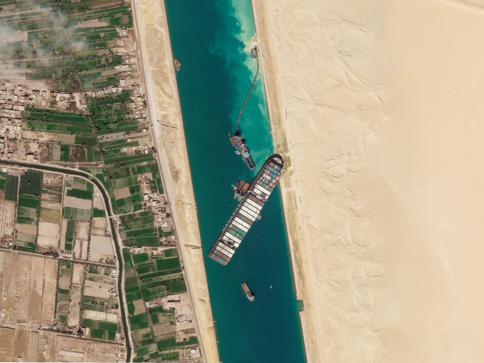 A satellite image shows the cargo ship MV Ever Given stuck in the Suez Canal near Suez, Egypt. Attempts to free the mammoth container ship stuck in Egypt's Suez Canal were almost successful Monday morning.
