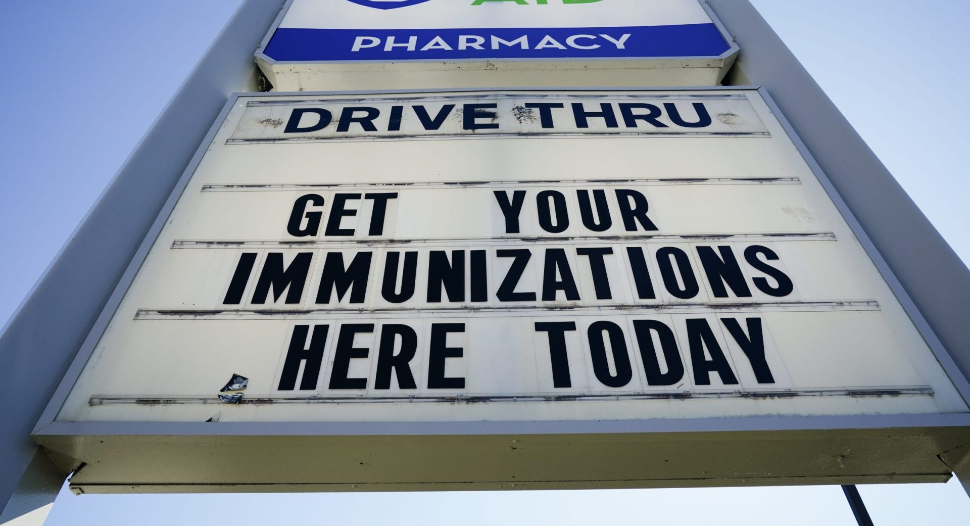 Shown is a sign outside a Rite-Aid pharmacy in Steelton, Pa., that is administering COVID-19 vaccinations, Friday, March 5, 2021.